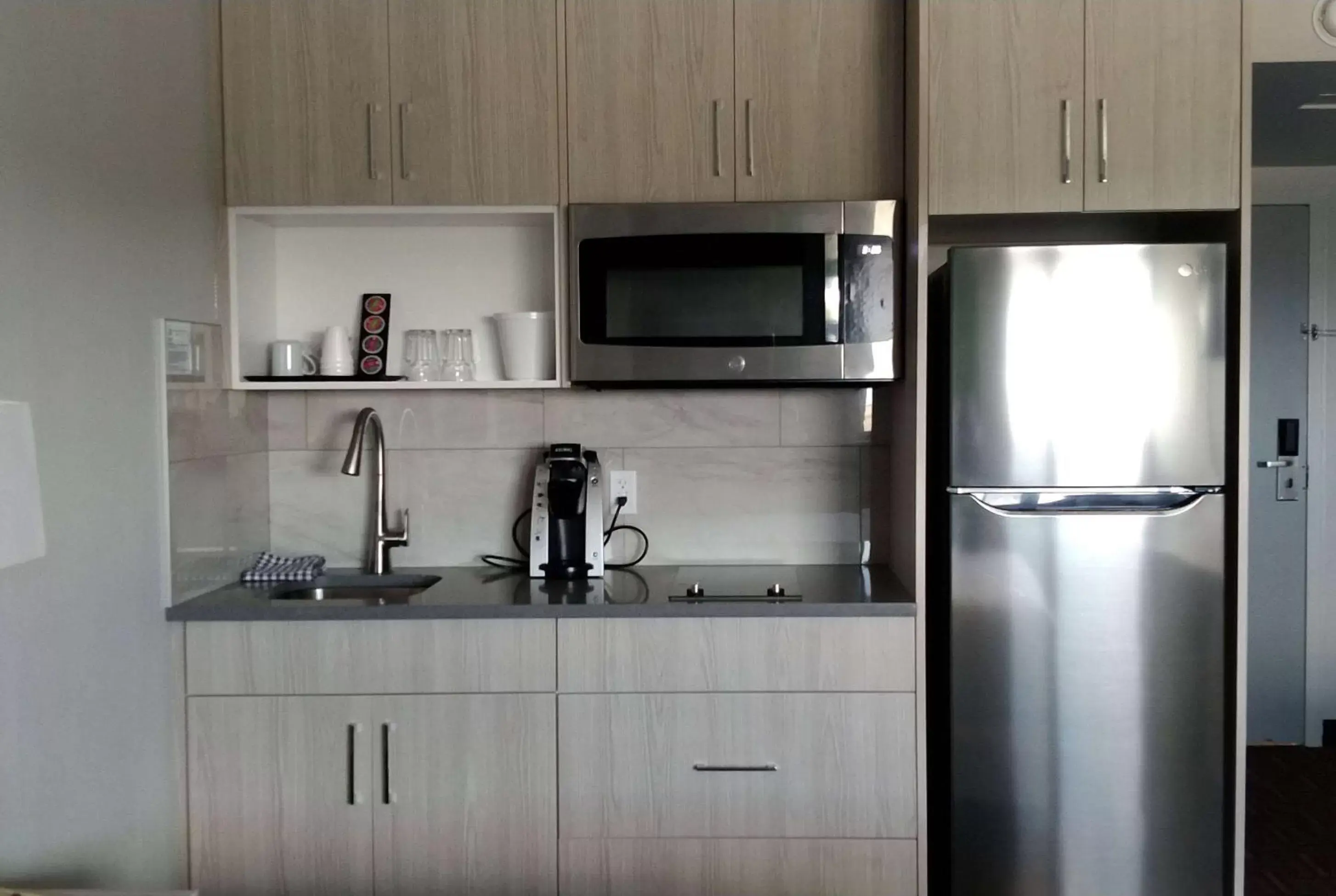 Photo of the whole room, Kitchen/Kitchenette in Wyndham Garden Medicine Hat Conference Center