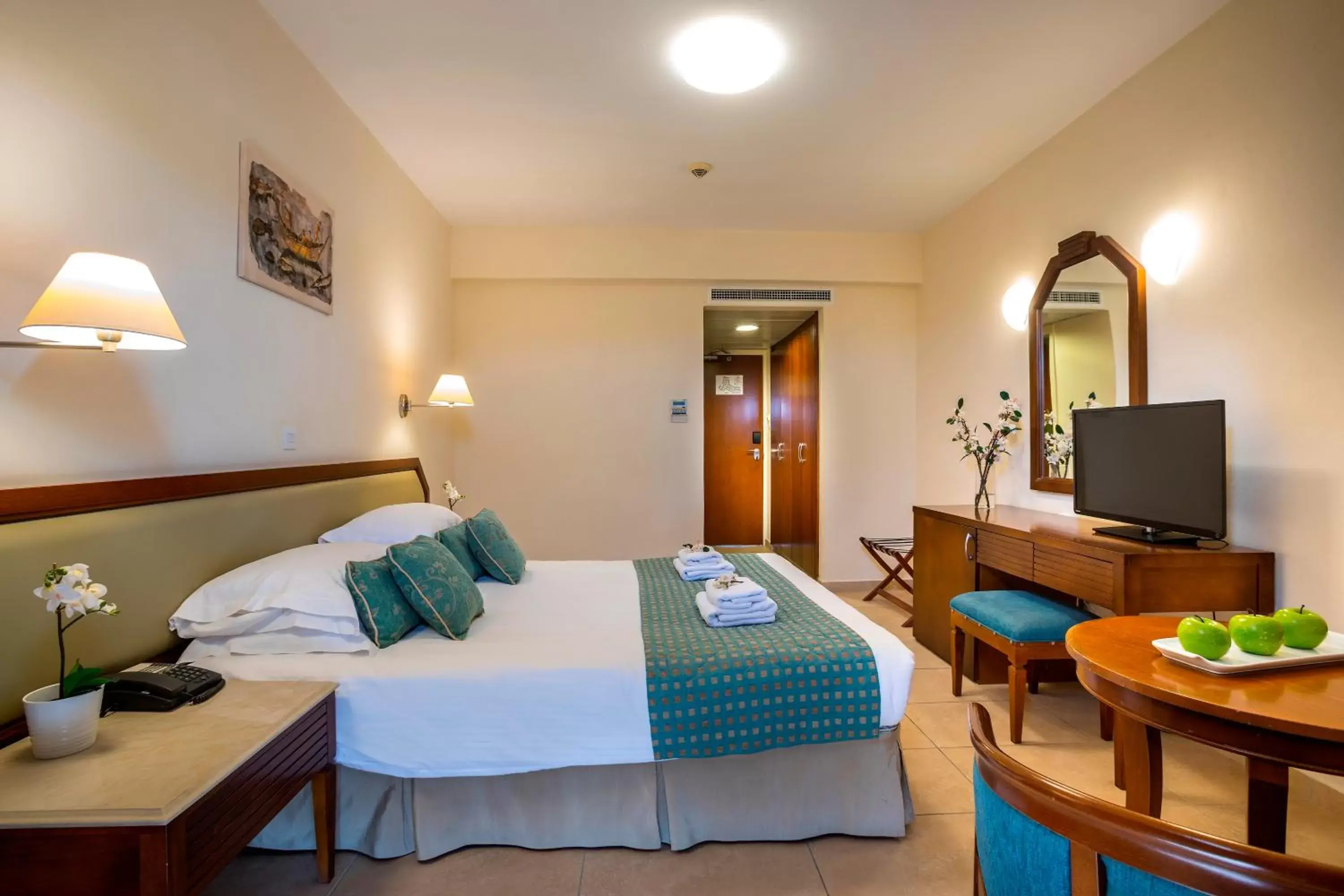 Bedroom in Aquamare Beach Hotel & Spa