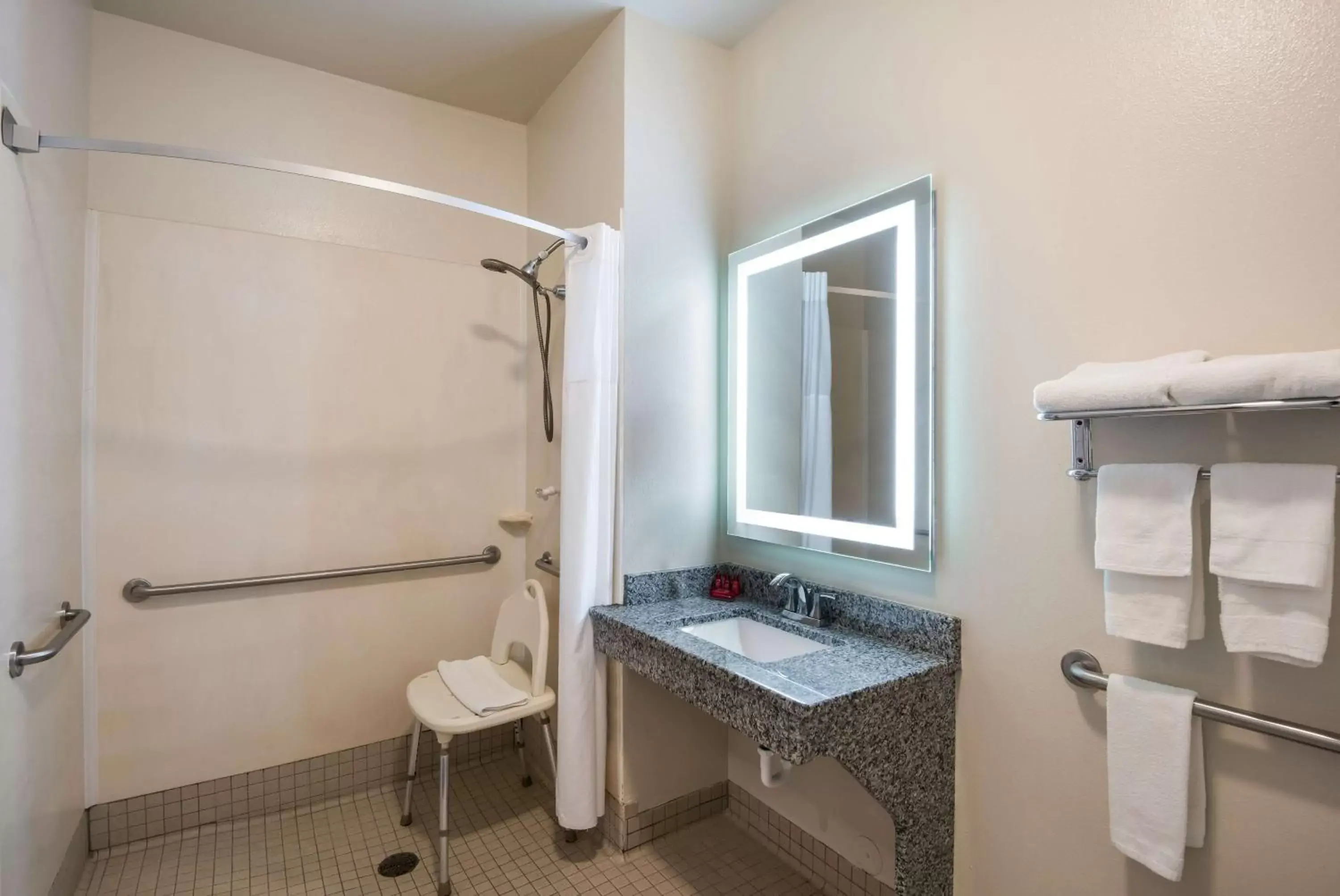 Bathroom in SureStay Plus Hotel by Best Western Coralville Iowa City