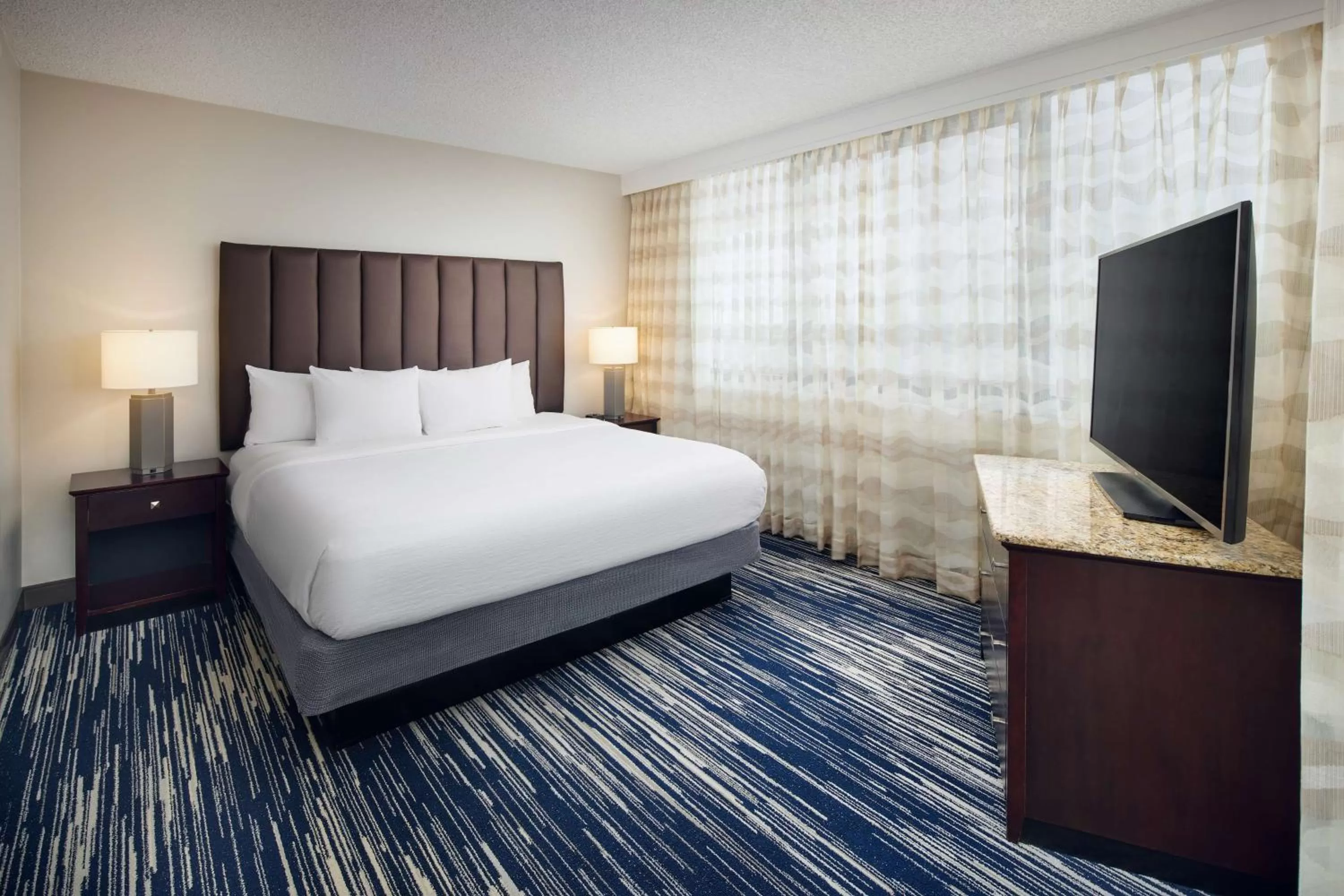 Bed in Embassy Suites by Hilton West Palm Beach Central