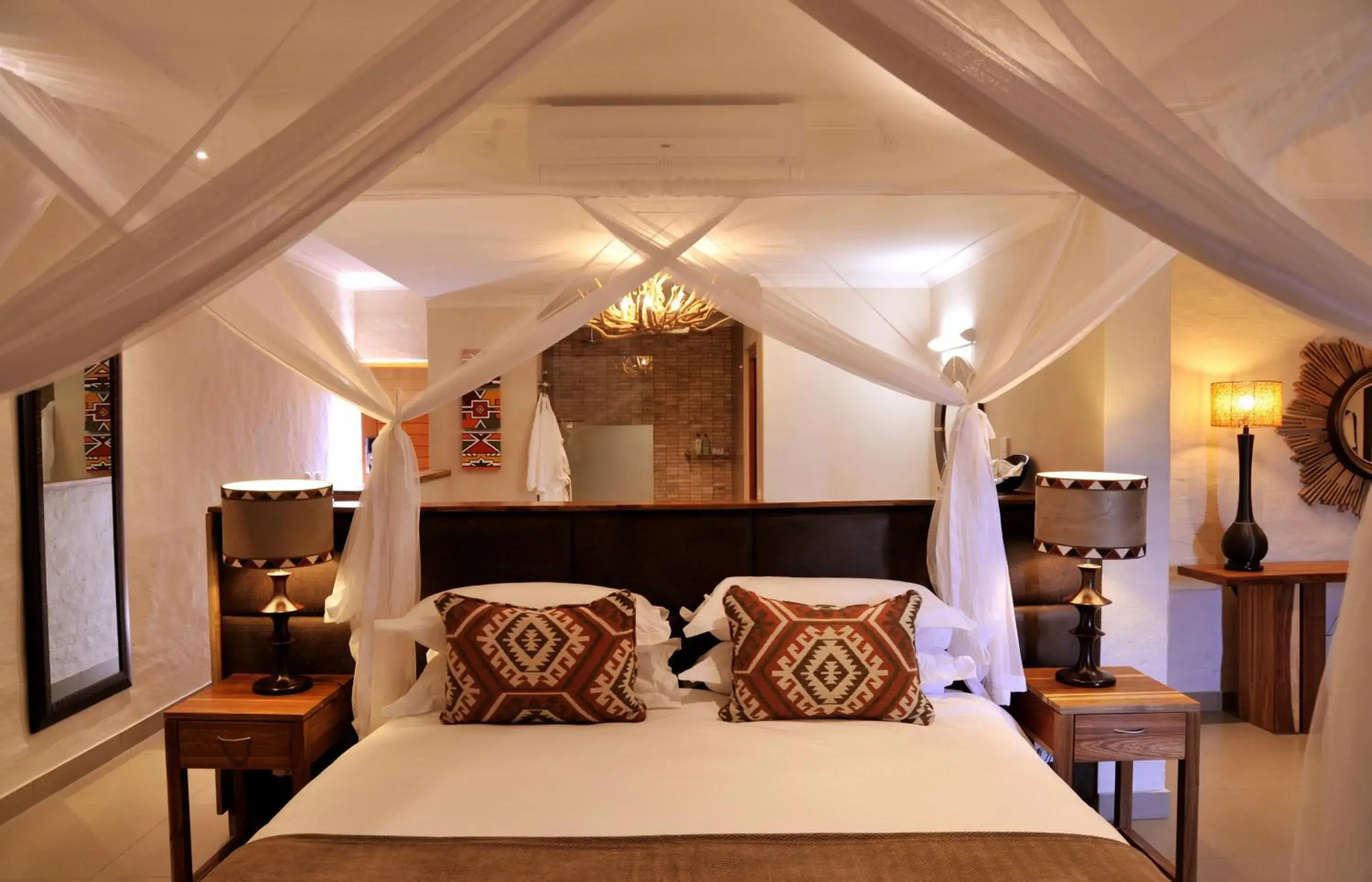 Bed in Victoria Falls Safari Club