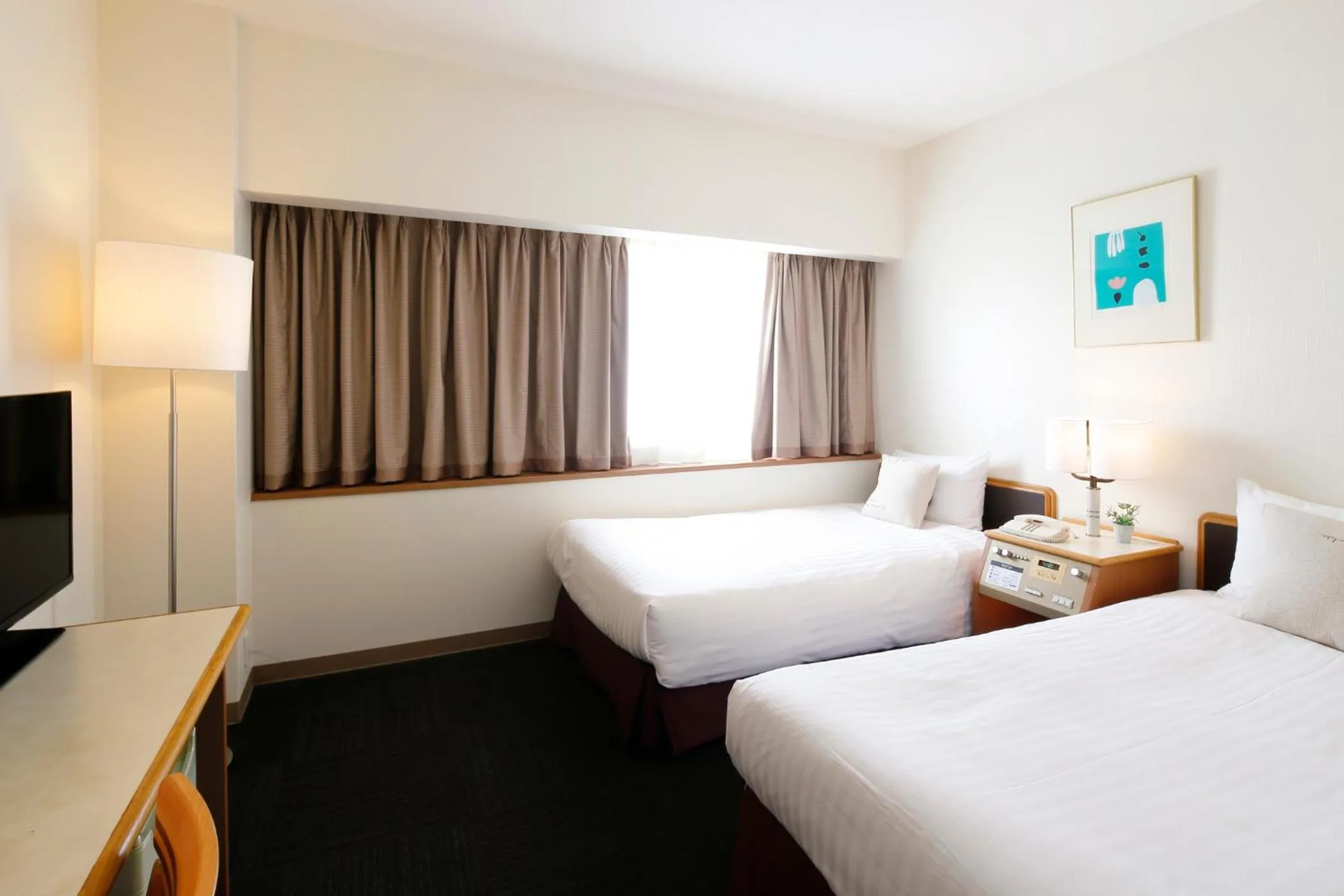 Bed in Hotel Resol Sasebo