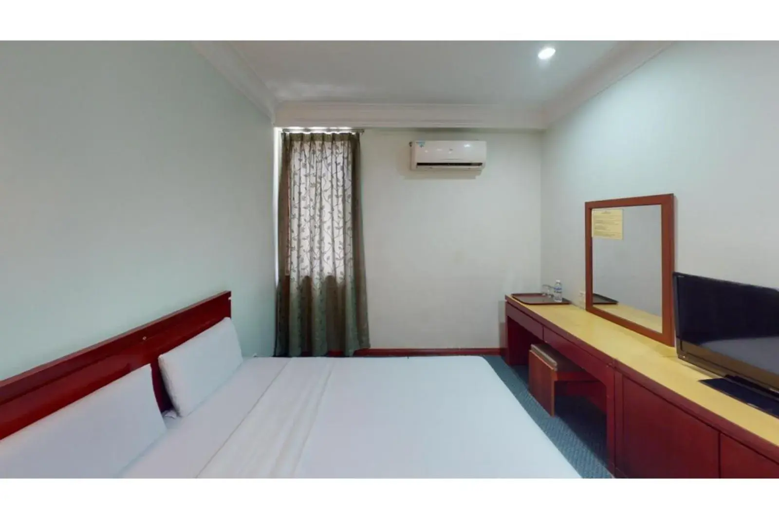 Bed in OYO 90847 Hotel Asia City