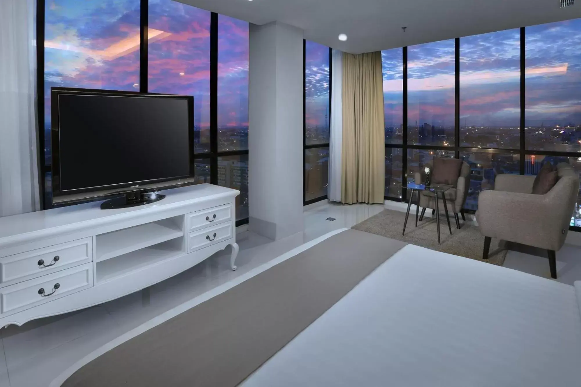 TV/Entertainment Center in Hotel Neo Gajah Mada Pontianak by ASTON