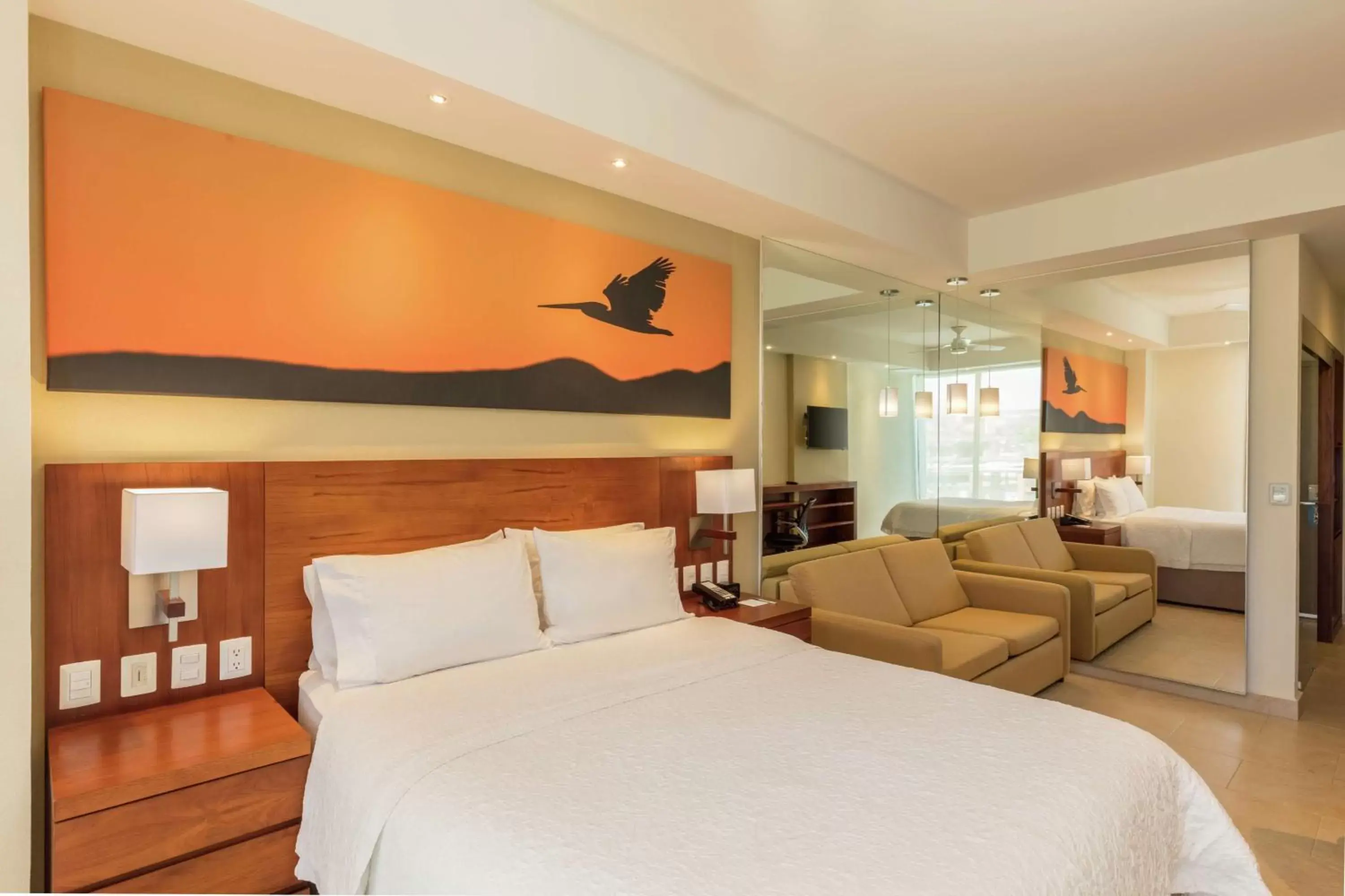 Living room, Bed in Hampton Inn & Suites by Hilton Los Cabos