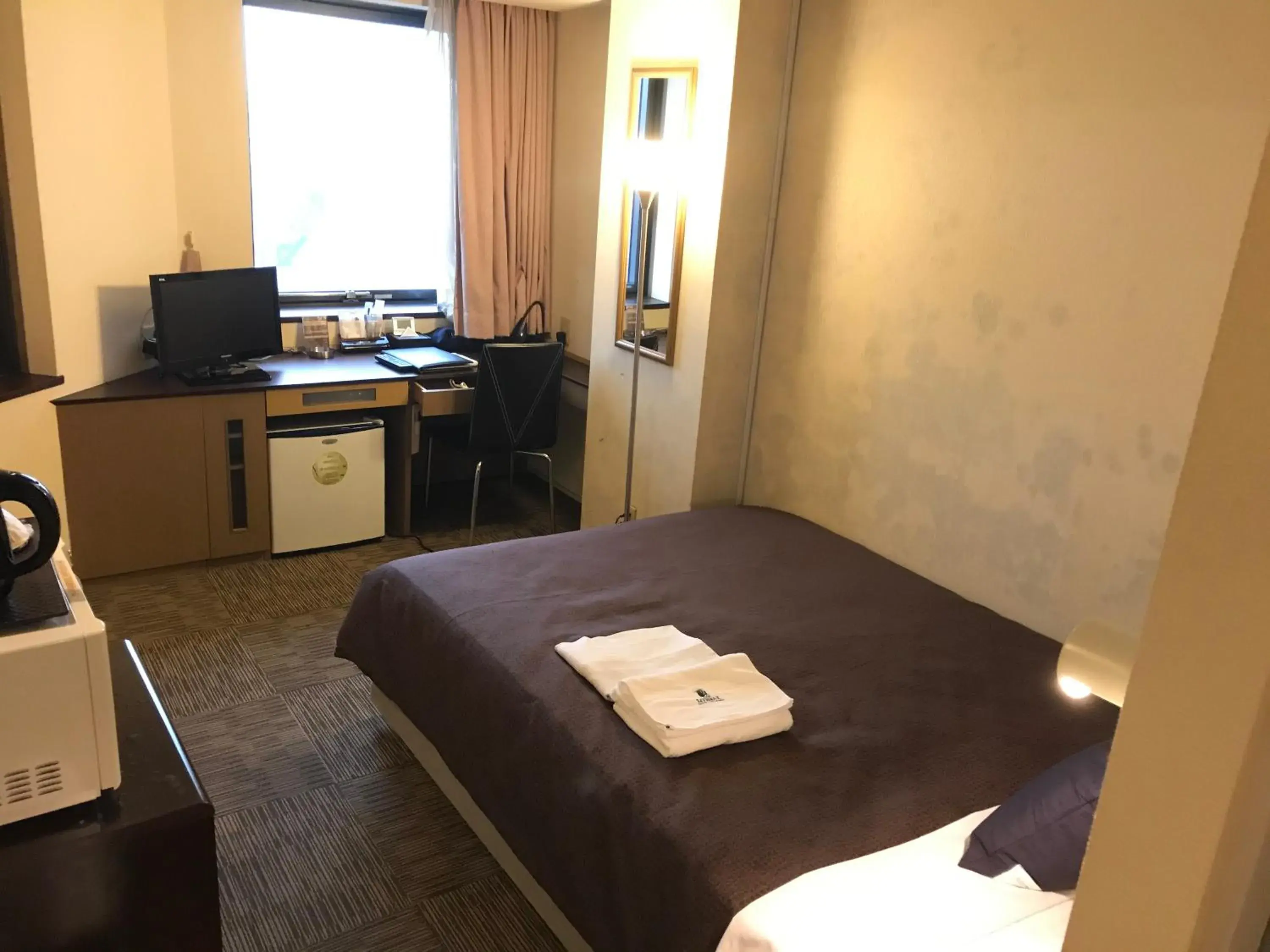 Bed in HOTEL LiVEMAX BUDGET Amagasaki