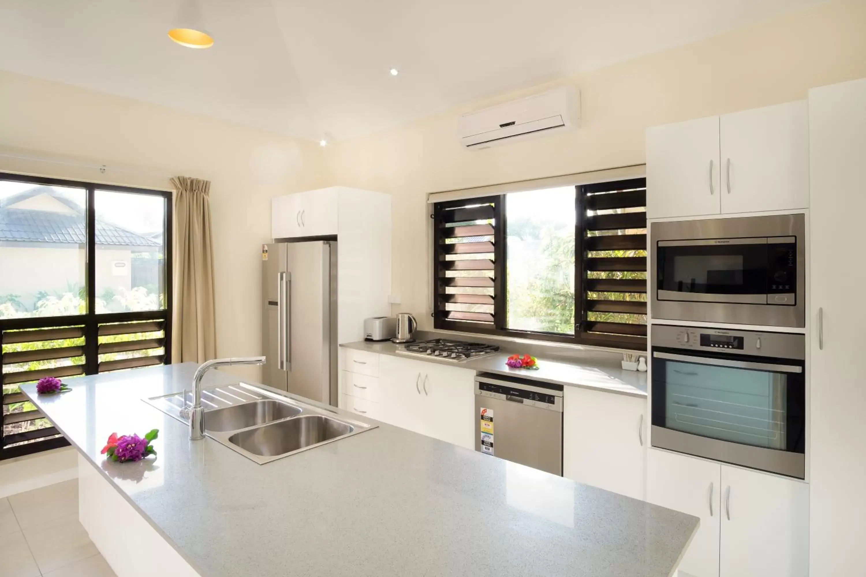 Kitchen or kitchenette, Kitchen/Kitchenette in First Landing Beach Resort & Villas