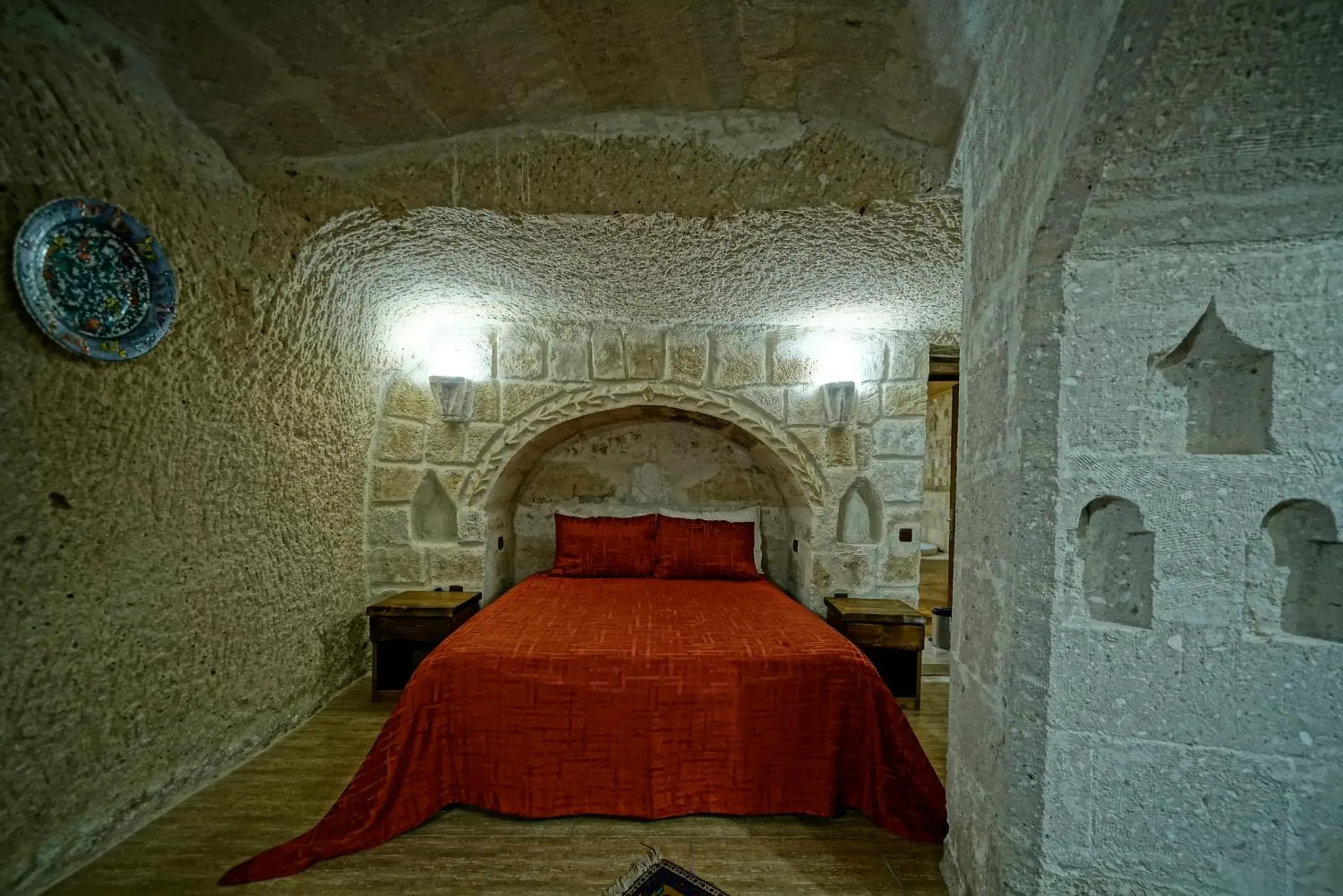 Bed in Holiday Cave Hotel