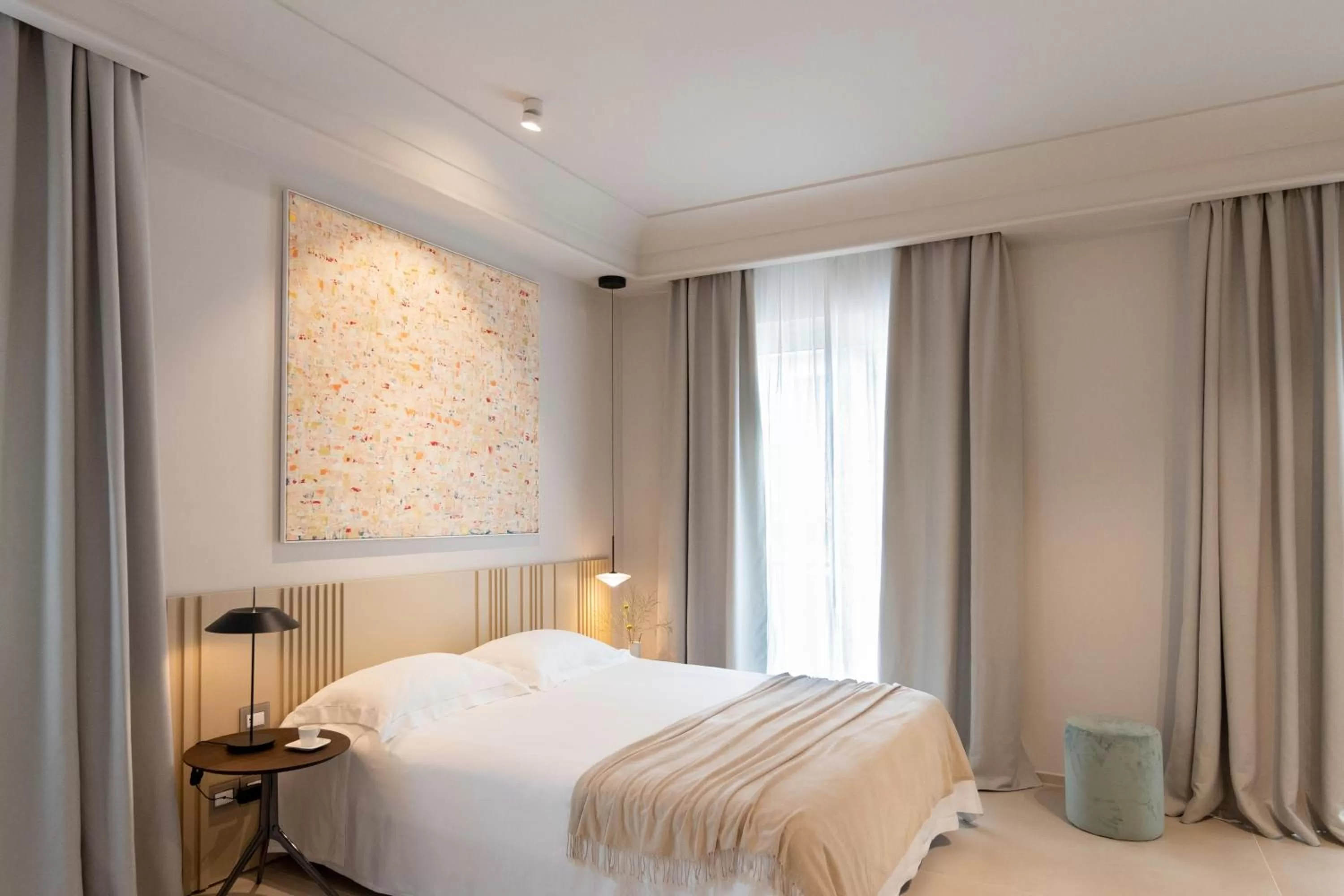 Bed in Taodomus Boutique Hotel