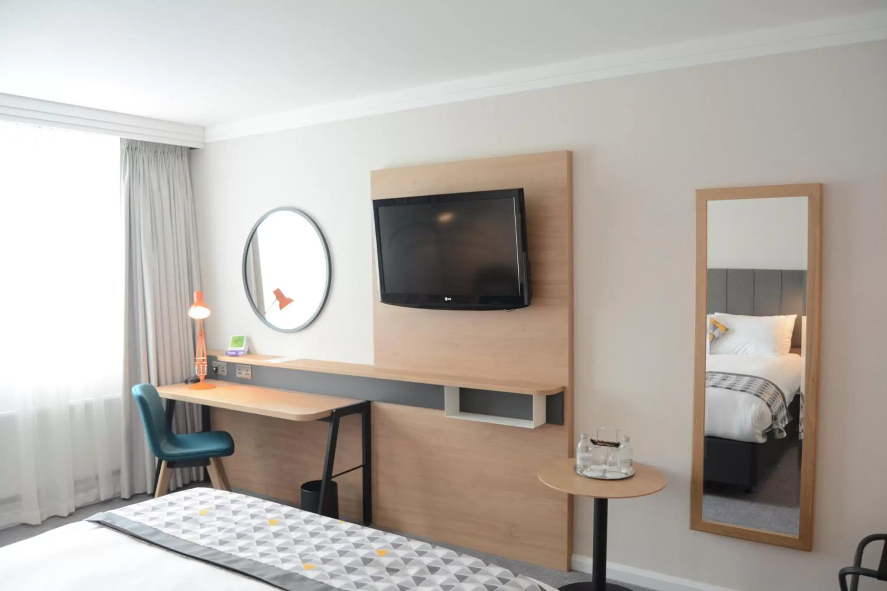 TV and multimedia, TV/Entertainment Center in Holiday Inn London - Gatwick Airport, an IHG Hotel