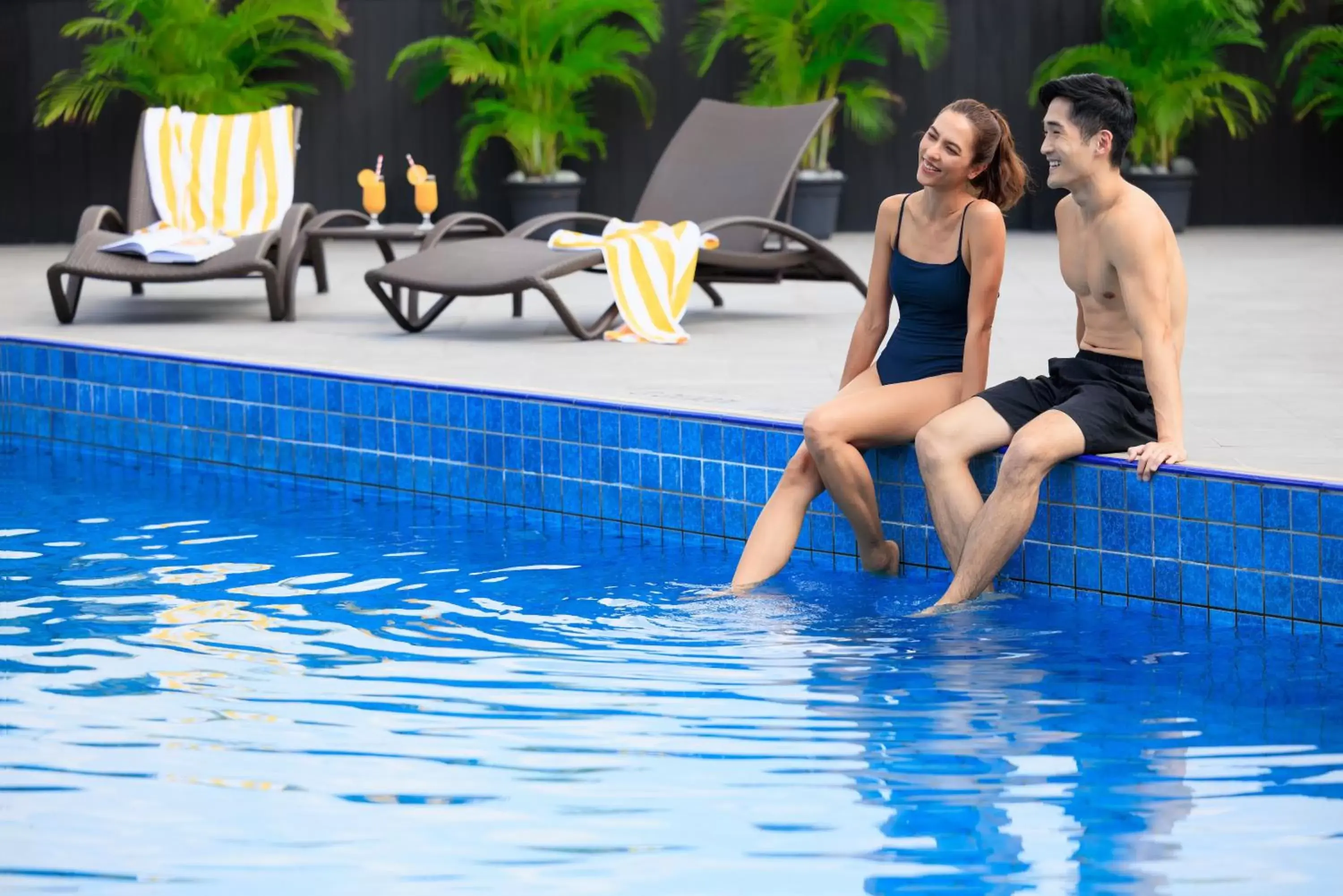 People, Swimming Pool in voco Orchard Singapore, an IHG Hotel
