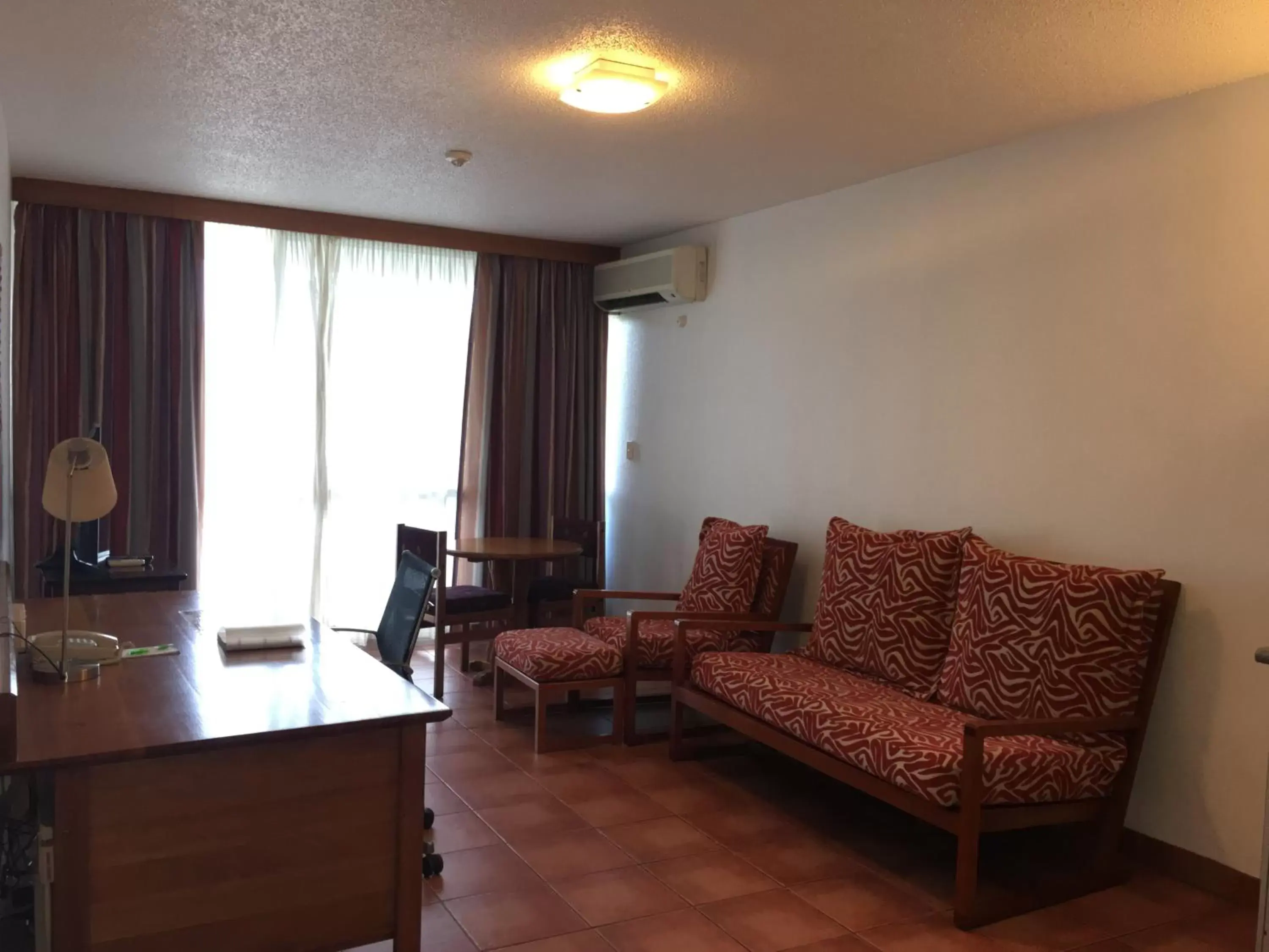 Living room, Seating Area in Holiday Inn & Suites Port Moresby, an IHG Hotel