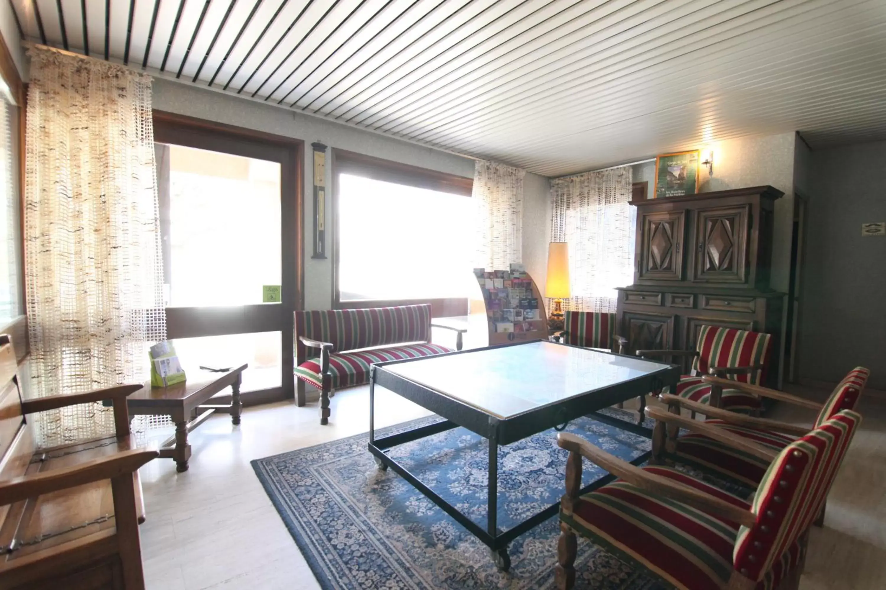 Decorative detail, Seating Area in Logis Hotel Restaurant Du Commerce