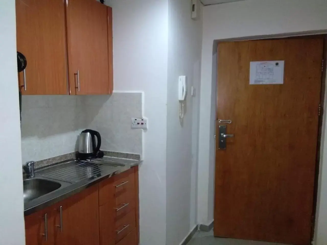 Kitchen/Kitchenette in Al Smou Hotel Apartments - MAHA HOSPITALITY GROUP