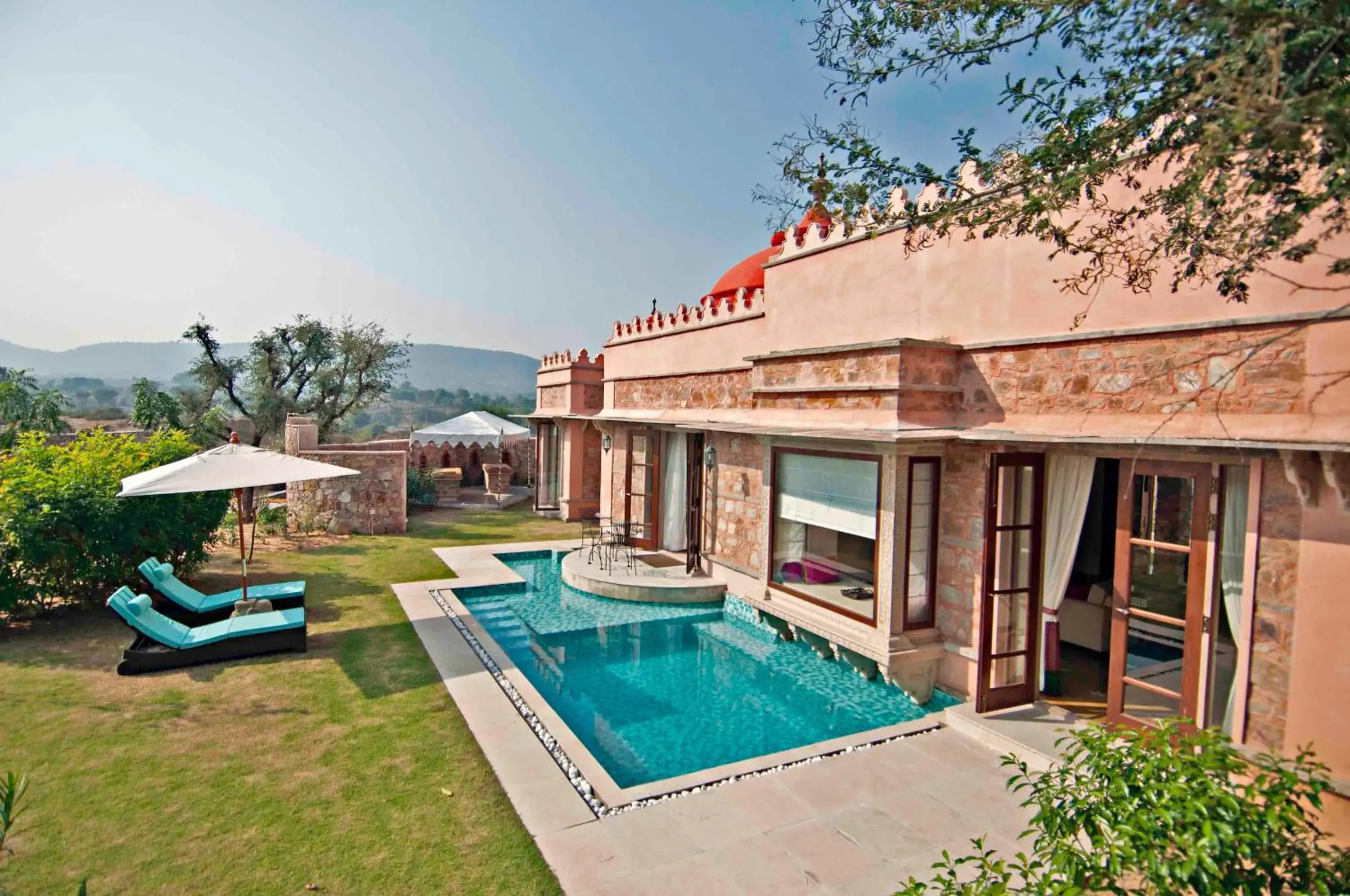 Patio, Swimming Pool in Tree of Life Resort & Spa Jaipur