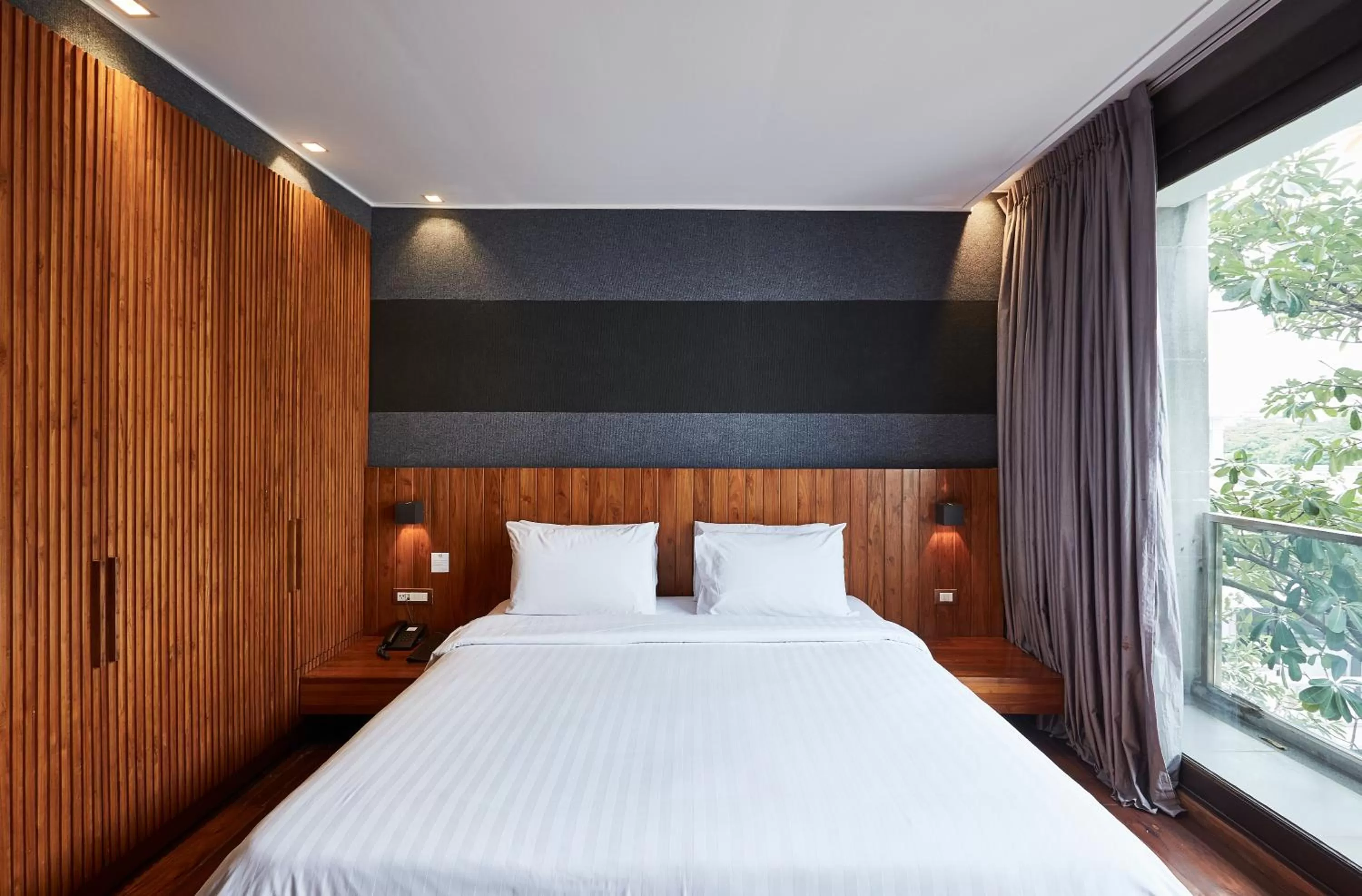 Bed in LUXX Langsuan Hotel - SHA Plus