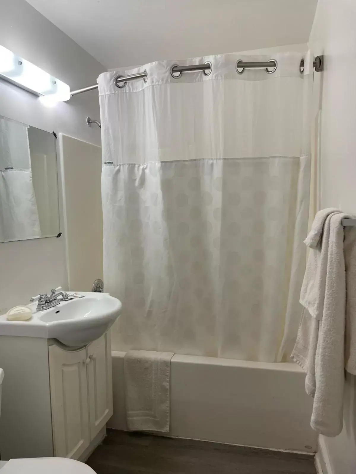 Bathroom in Travelodge by Wyndham London Ontario