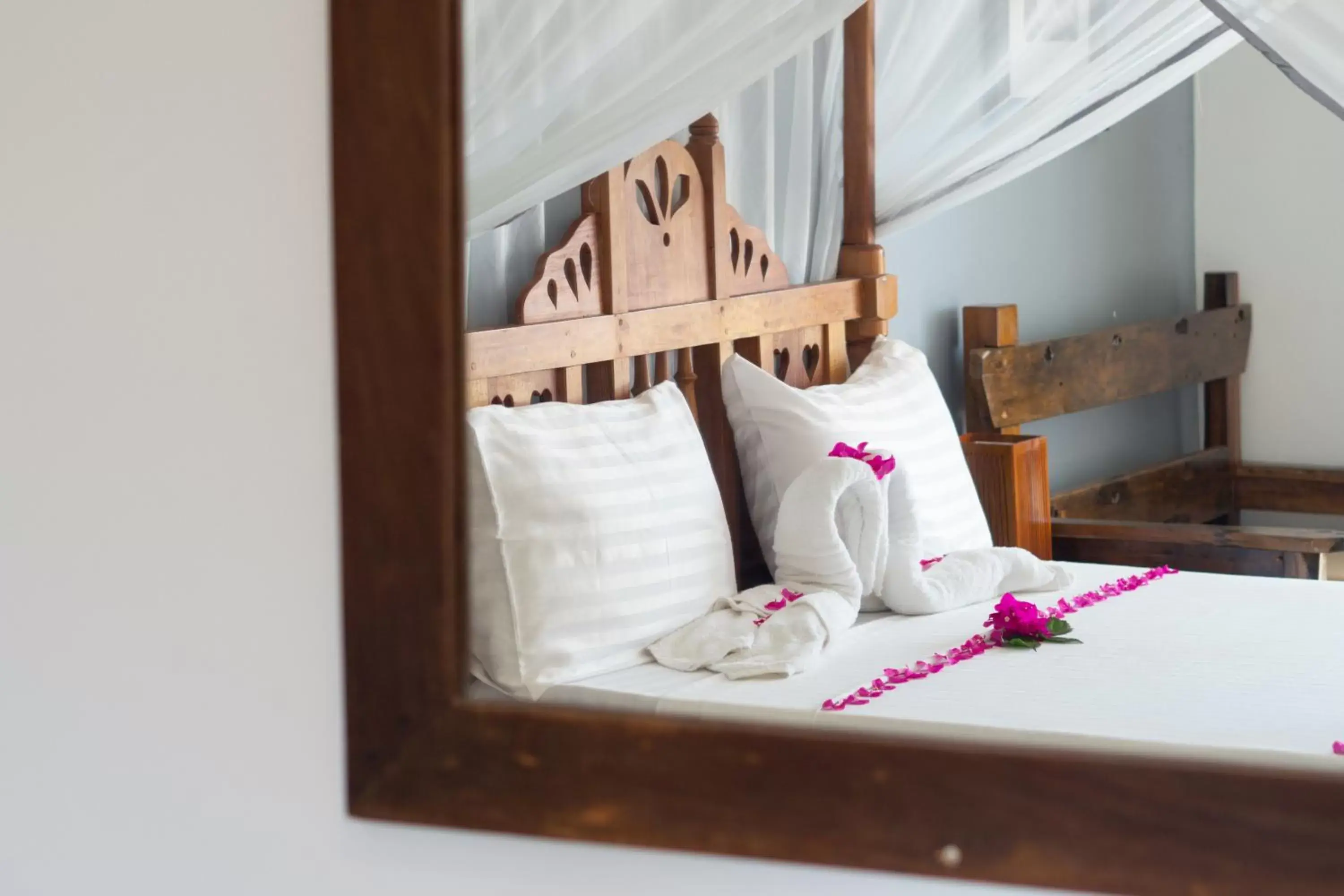 Bed in Tanzanite Beach Resort Bed in Tanzanite Beach Resort