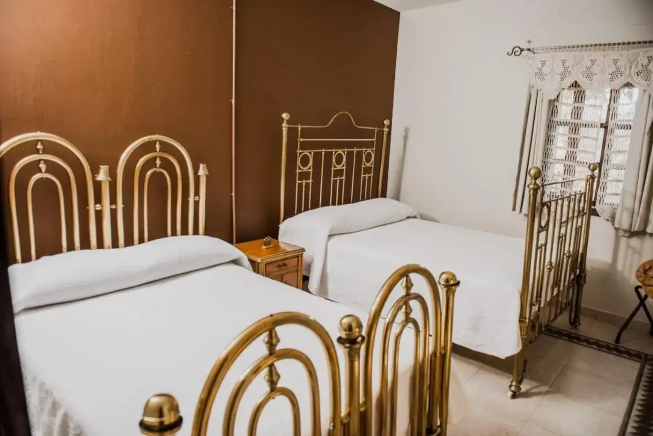 Bed in TIERRA SOÑADA HOTEL BOUTIQUE