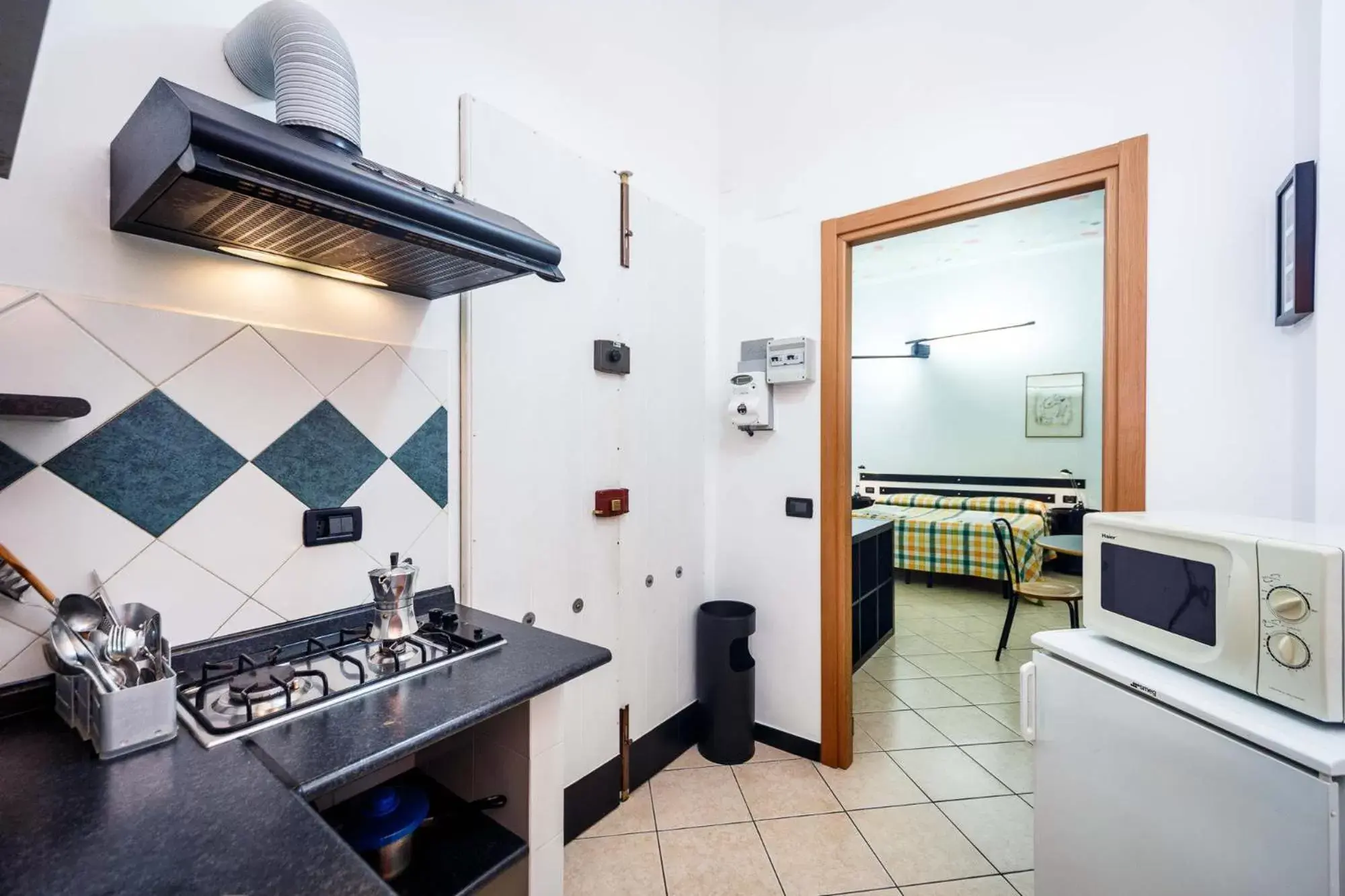 Kitchen/Kitchenette in Hotel Cairoli