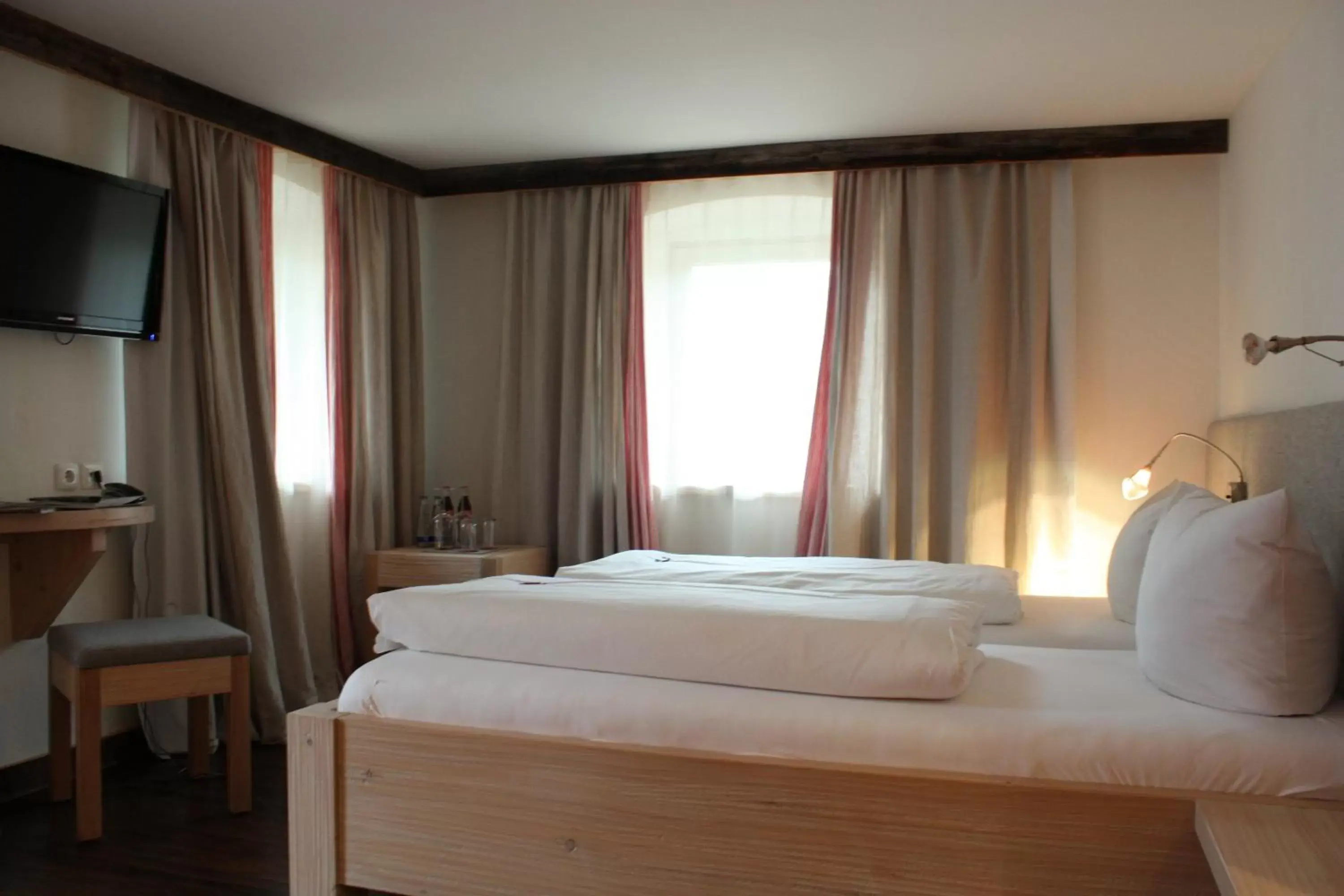 Bed in Das Posch Hotel