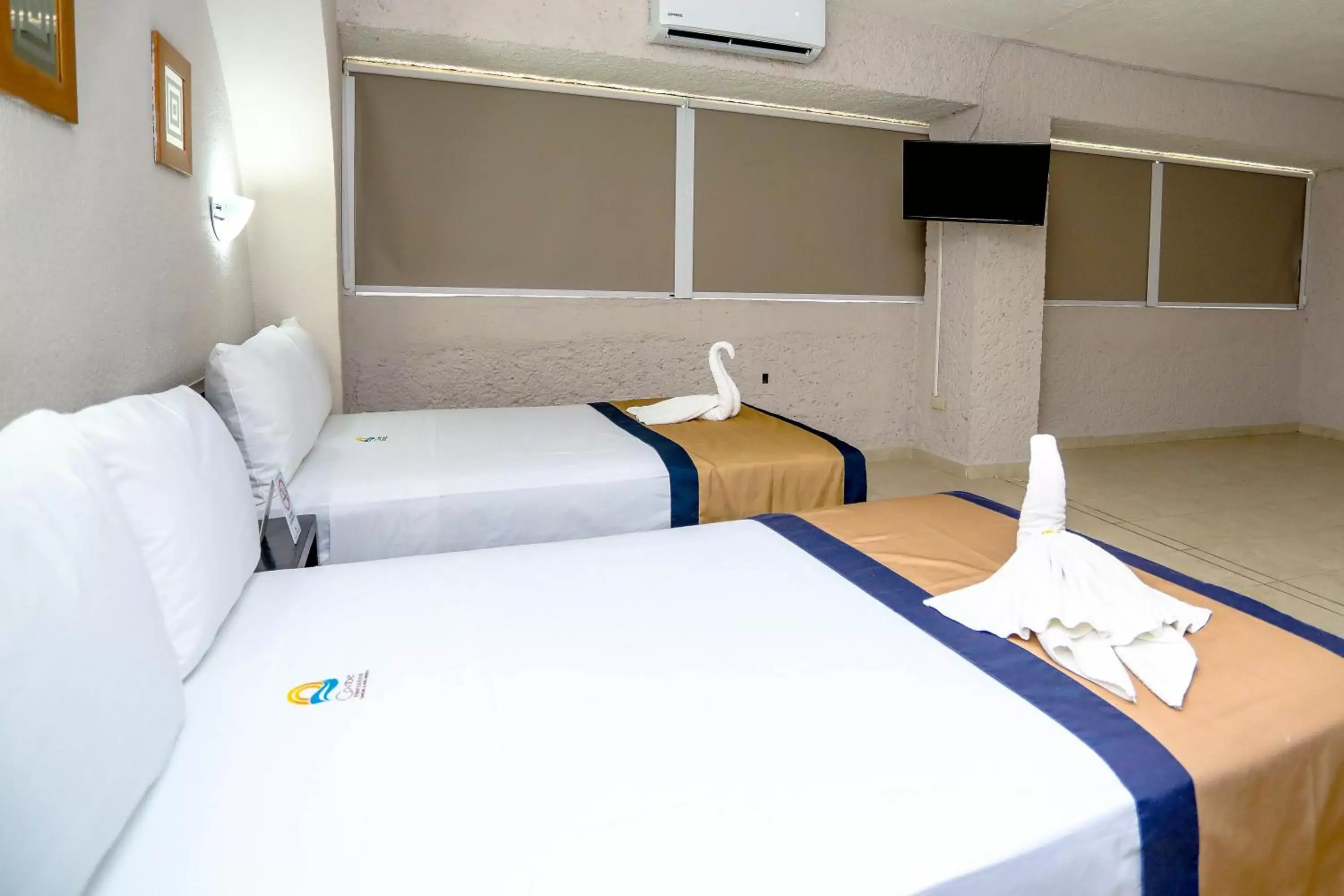 Bed in Hotel Caribe Internacional Cancun