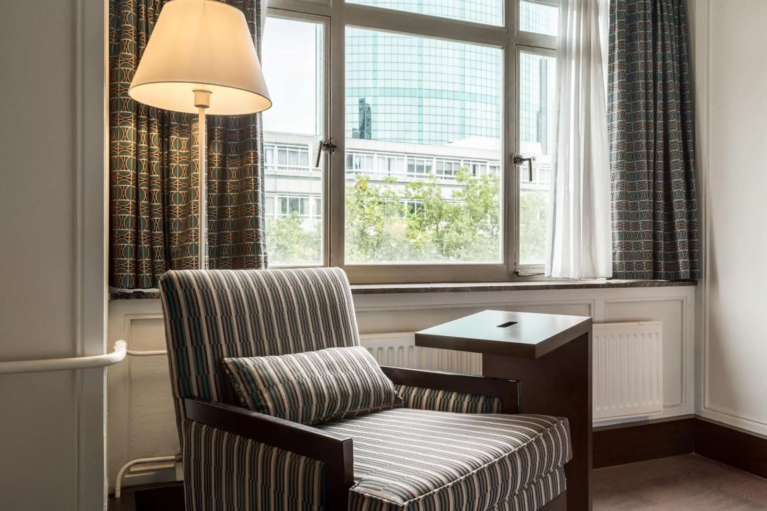 Bedroom, Seating Area in NH Atlanta Rotterdam Hotel