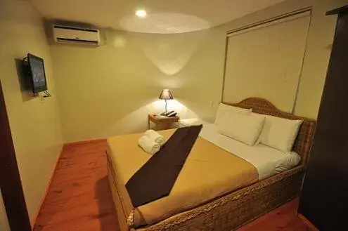 Bed in Grande Vista Hotel