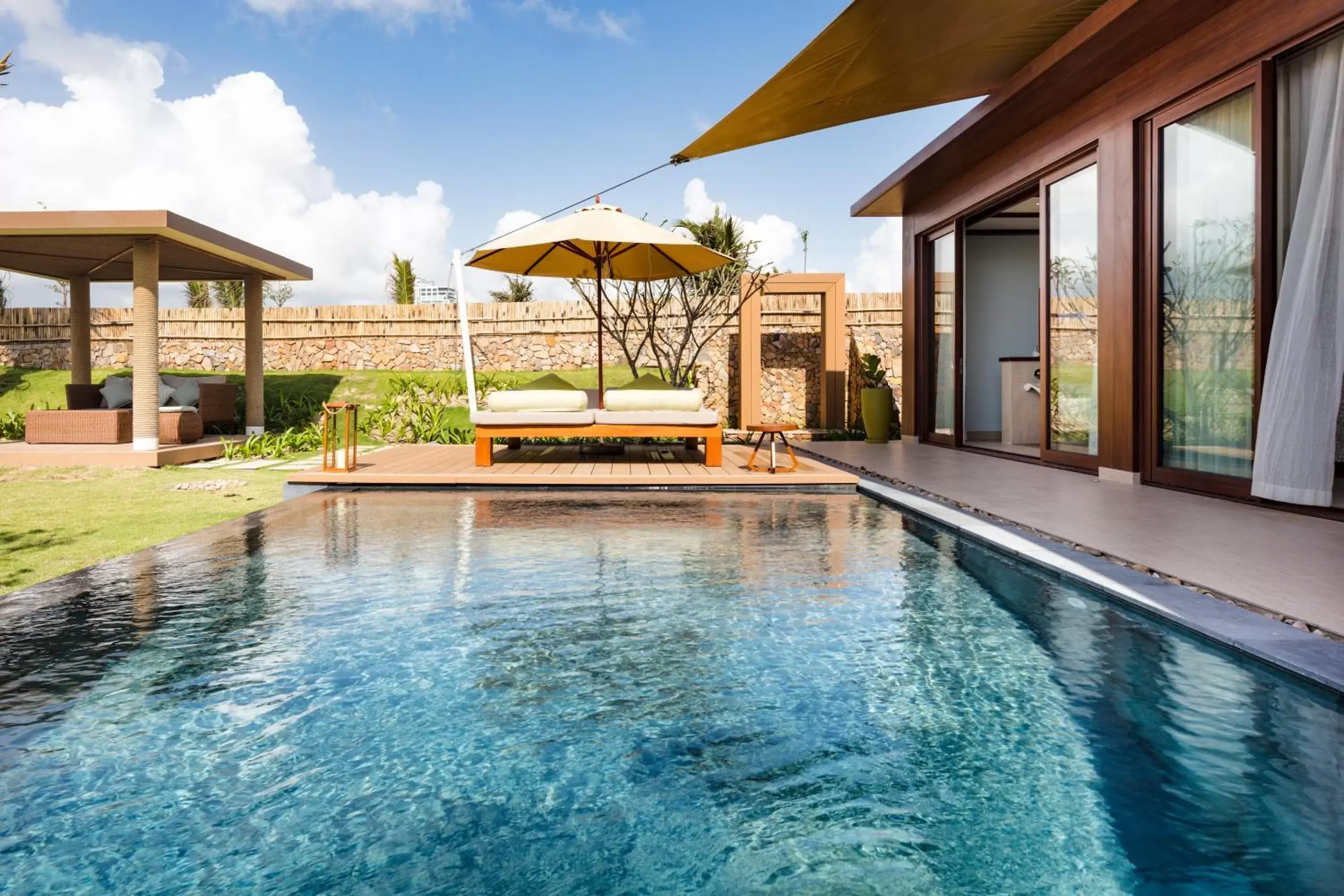 Swimming pool in Fusion Resort Cam Ranh - All Spa Inclusive Swimming pool in Fusion Resort Cam Ranh - All Spa Inclusive