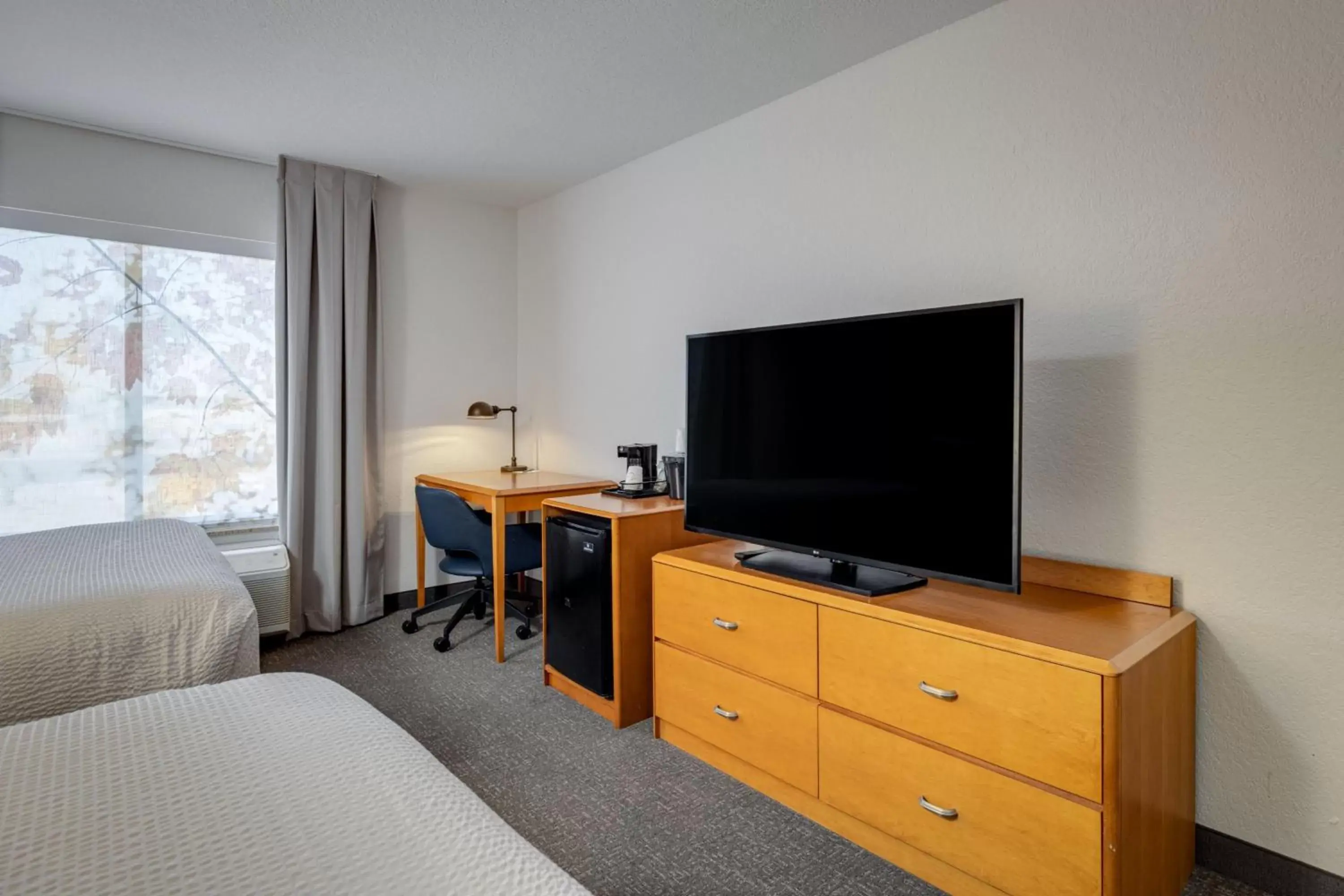 Photo of the whole room, TV/Entertainment Center in Fairfield Inn & Suites by Marriott Lawton