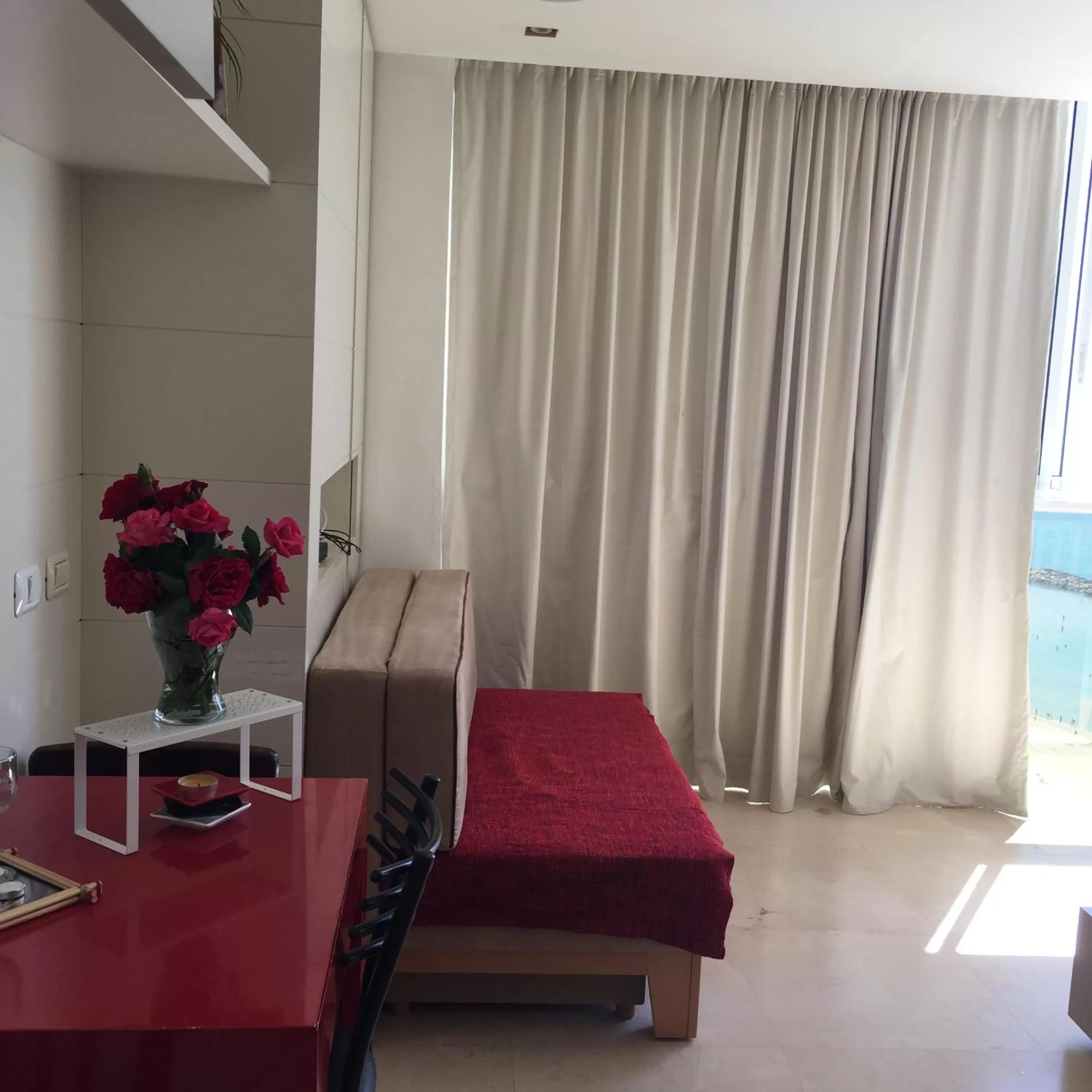 Seating area, Bed in Raphael Apartments