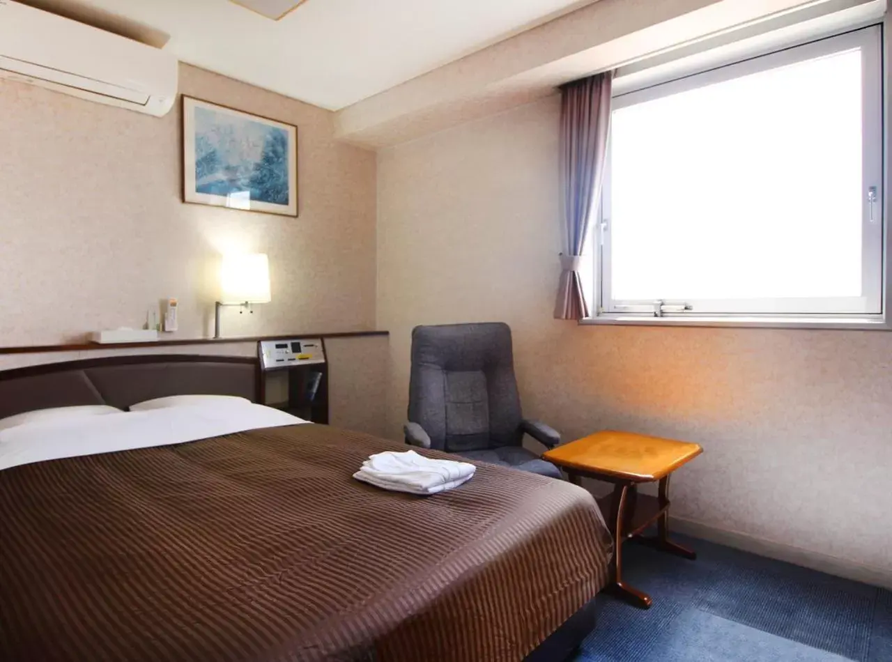 Photo of the whole room, Bed in Royal Inn Kakegawa (Station Hotel 2)