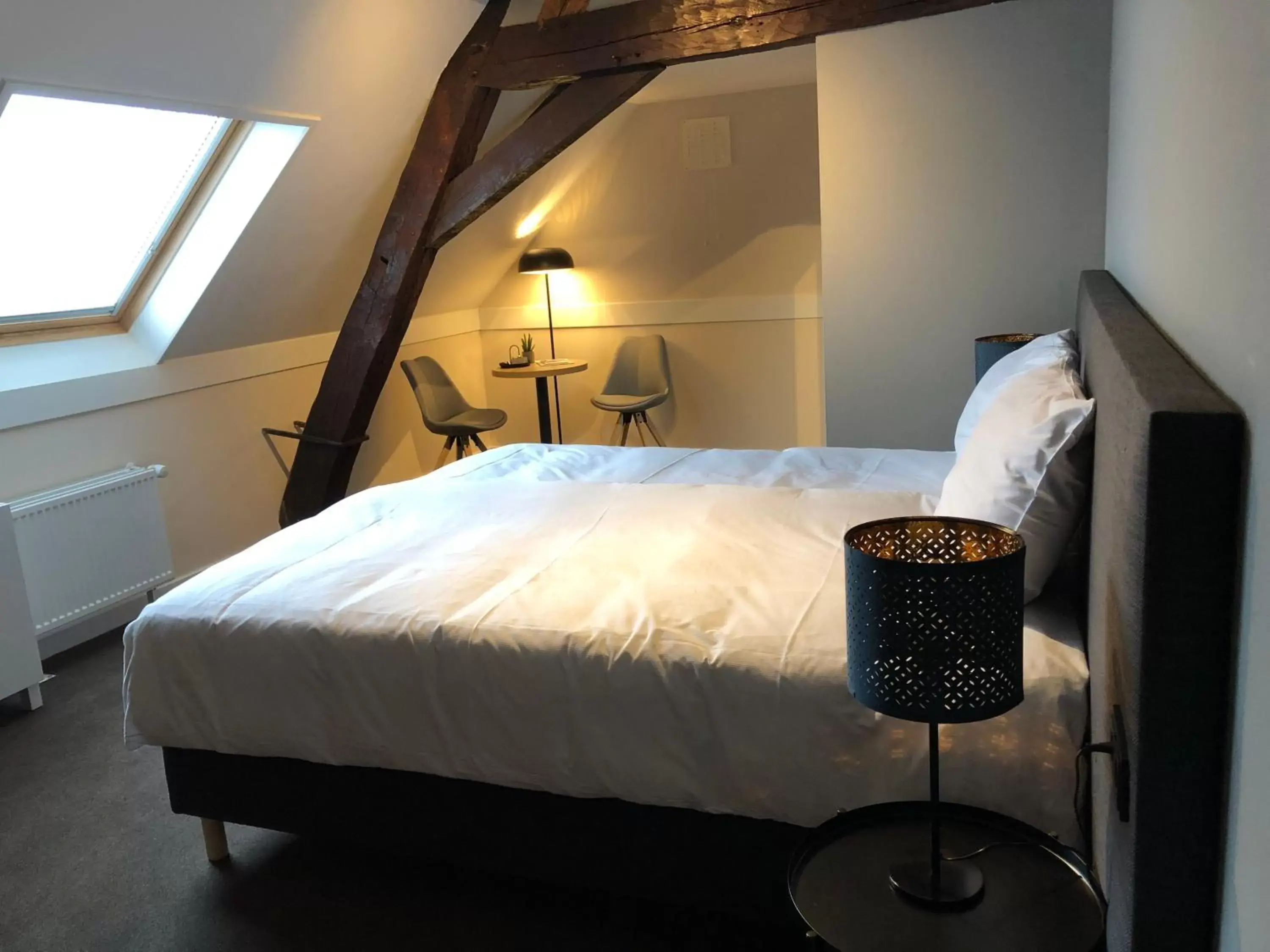 Bed in De Pastorie Bed & Breakfast