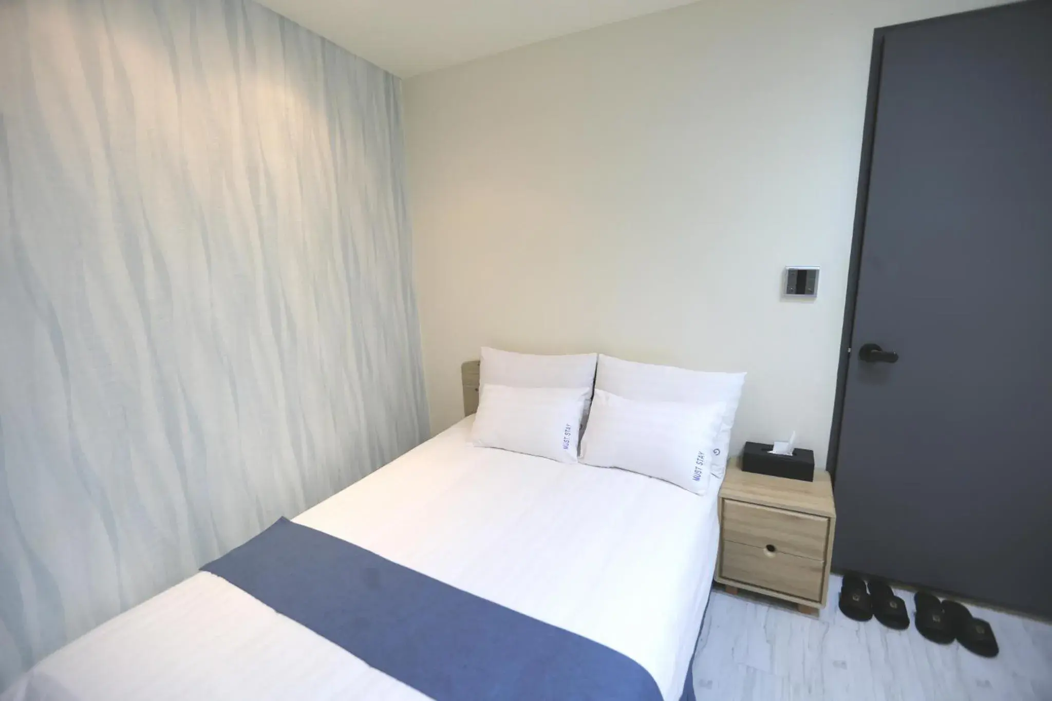 Bed in MUST STAY HOTEL Myeongdong