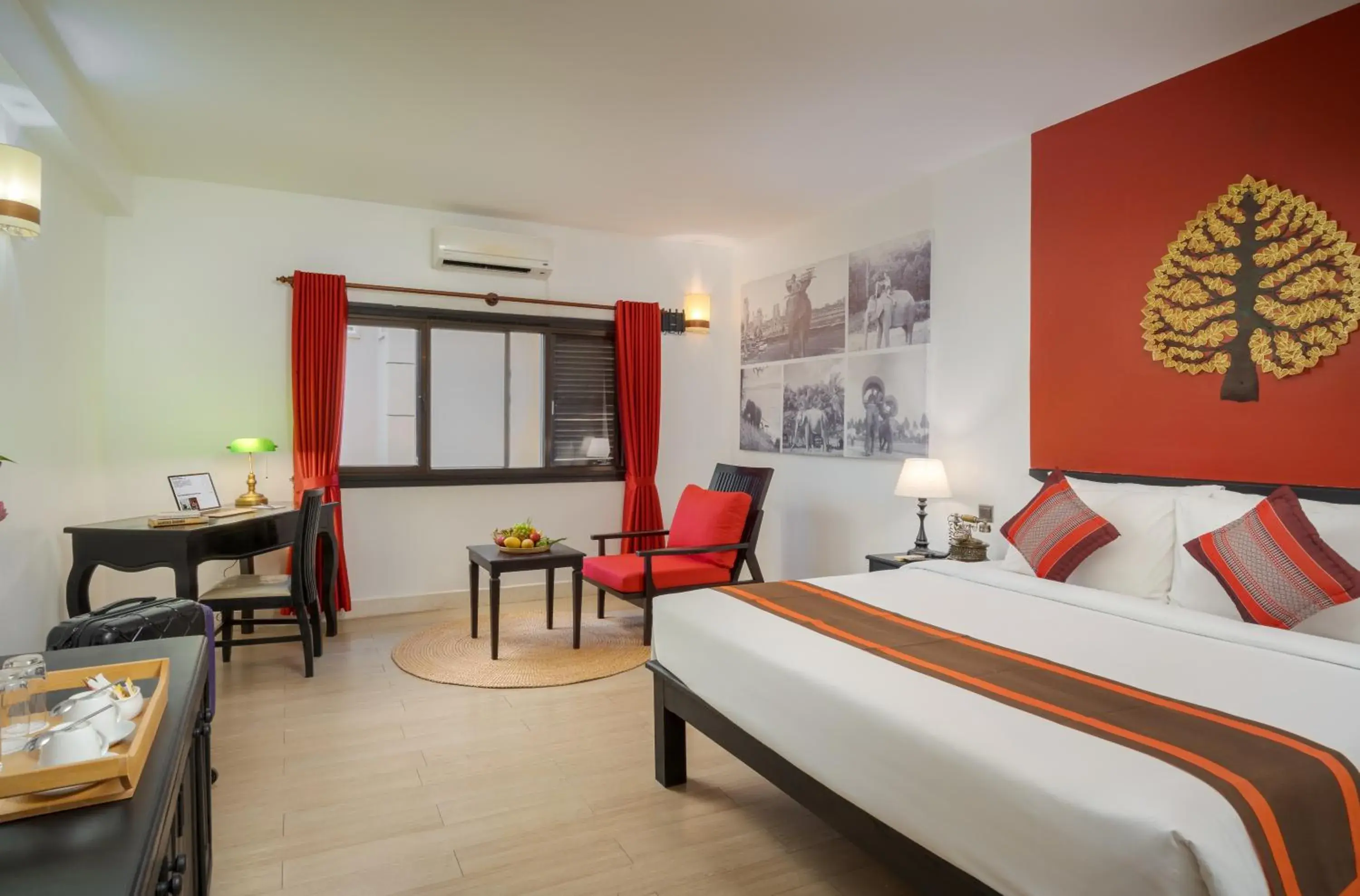 Bed in Pandora Suite D'Angkor Bed in Pandora Suite D'Angkor