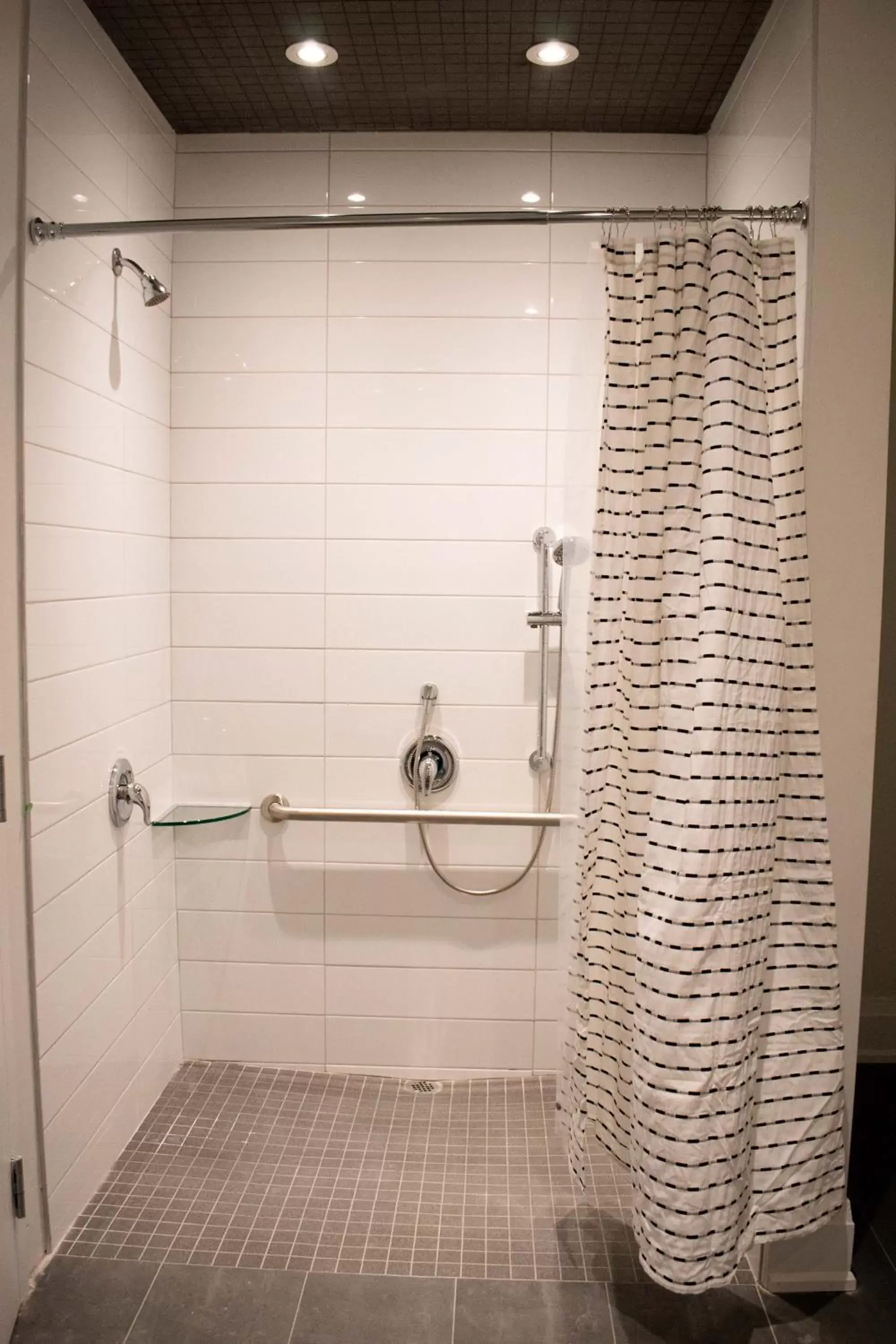 Bathroom in Colonial Hotel & Suites