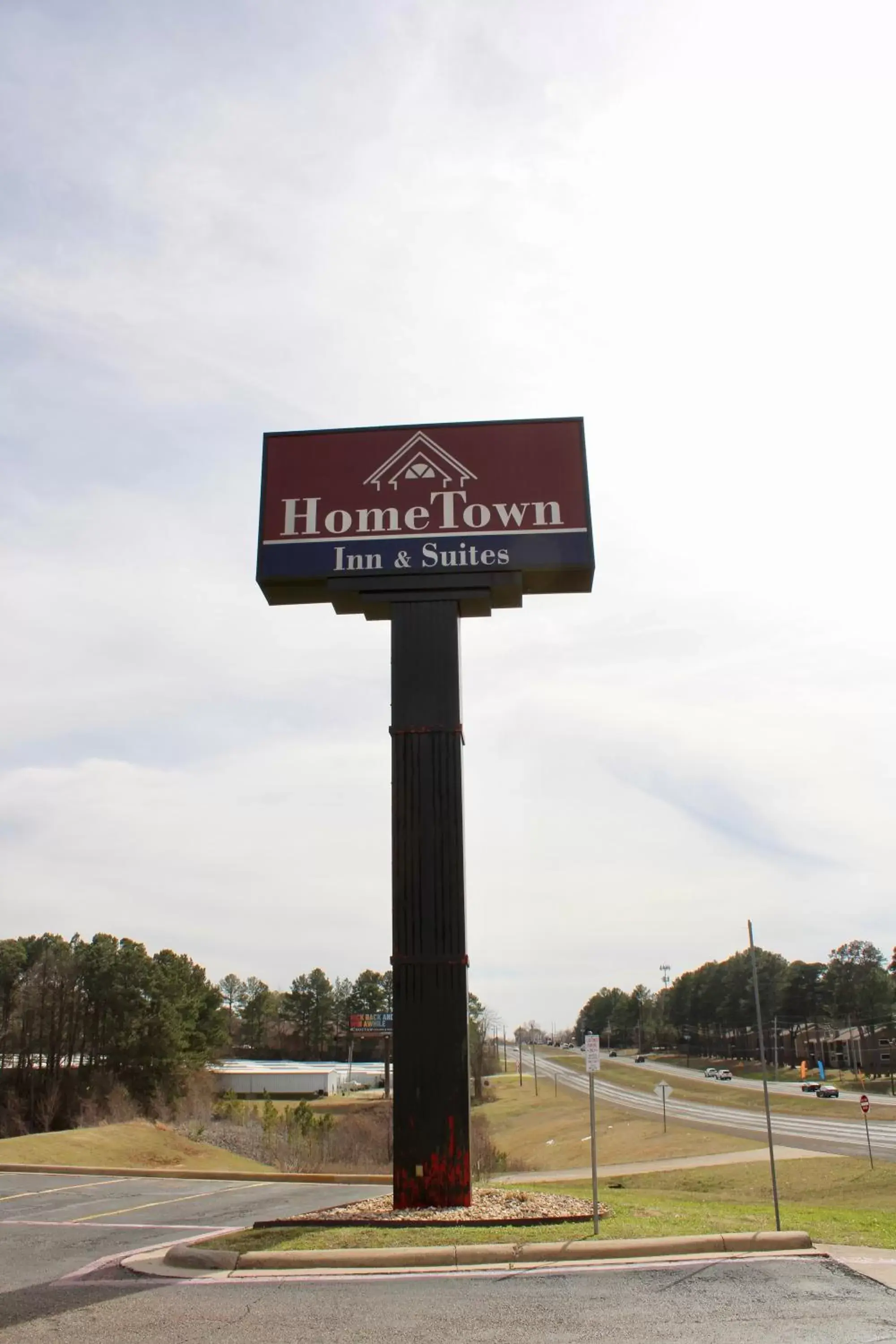 Property logo or sign in HomeTown Inn & Suites