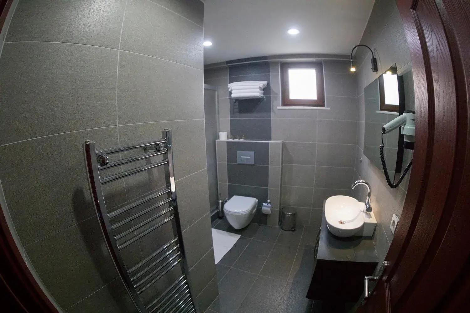 Photo of the whole room, Bathroom in Ramparts Hotel
