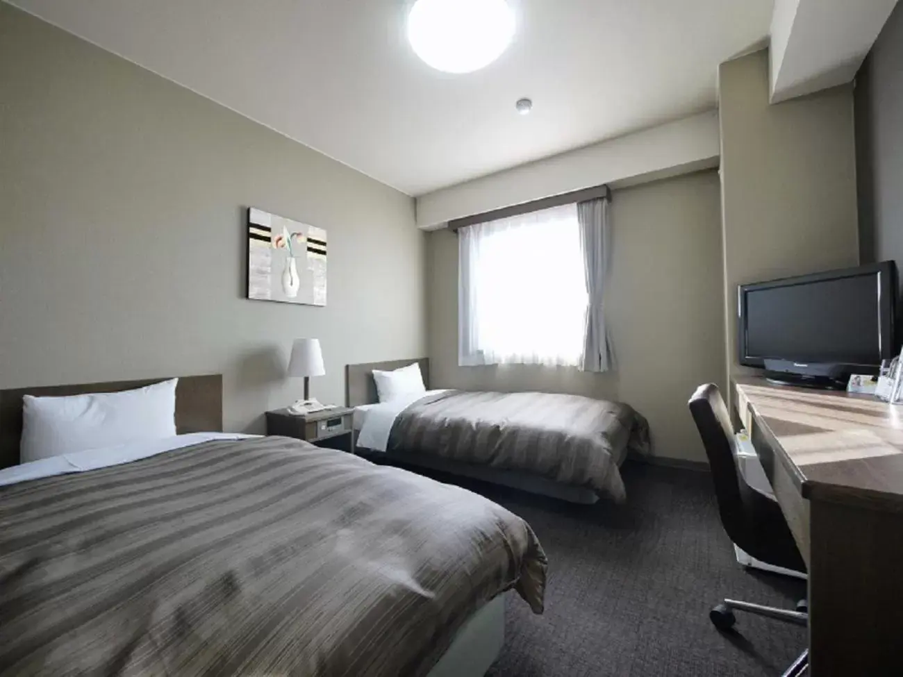Bed in Hotel Route-Inn Myoko Arai
