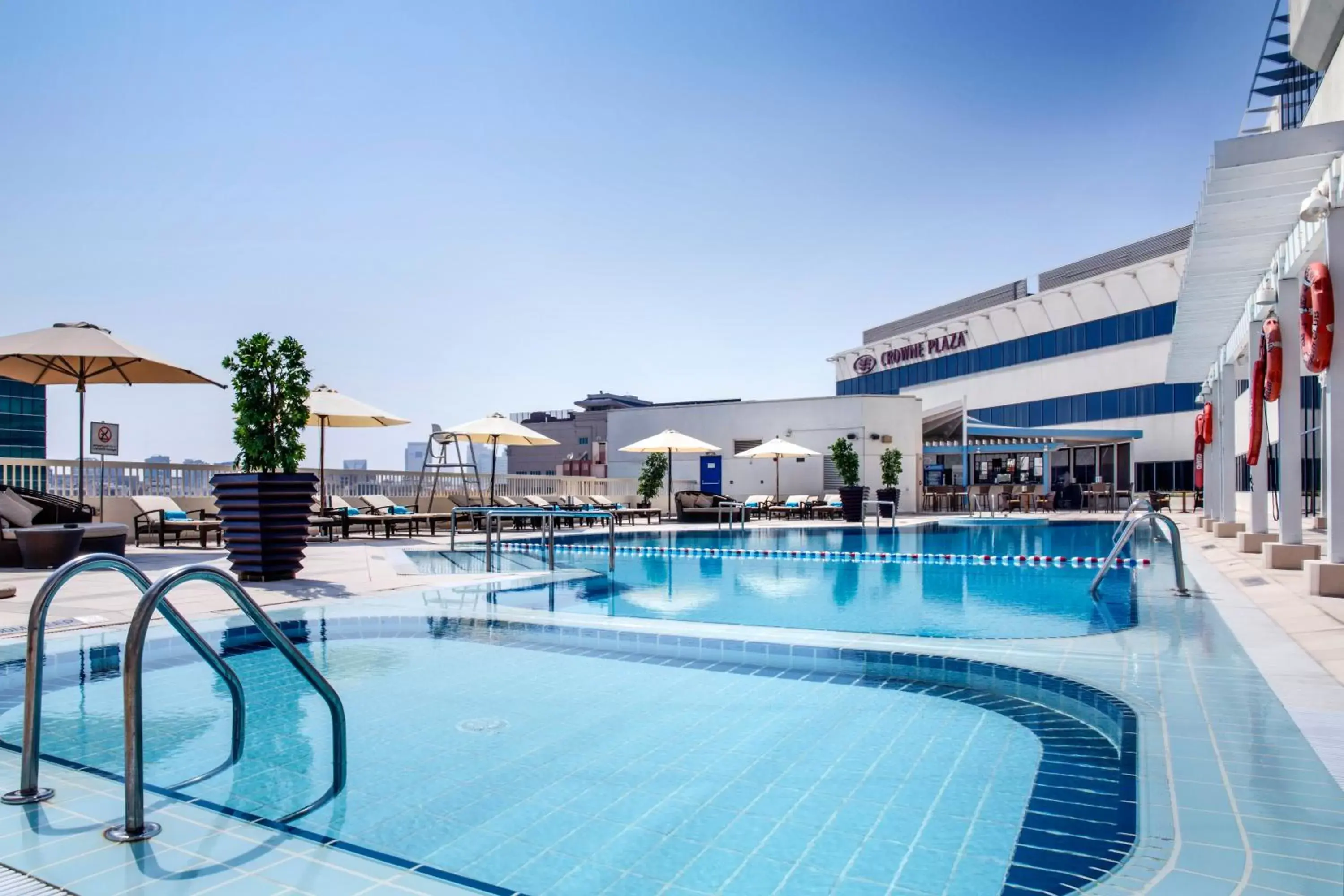 Swimming pool, Property Building in Crowne Plaza Dubai Deira, an IHG Hotel