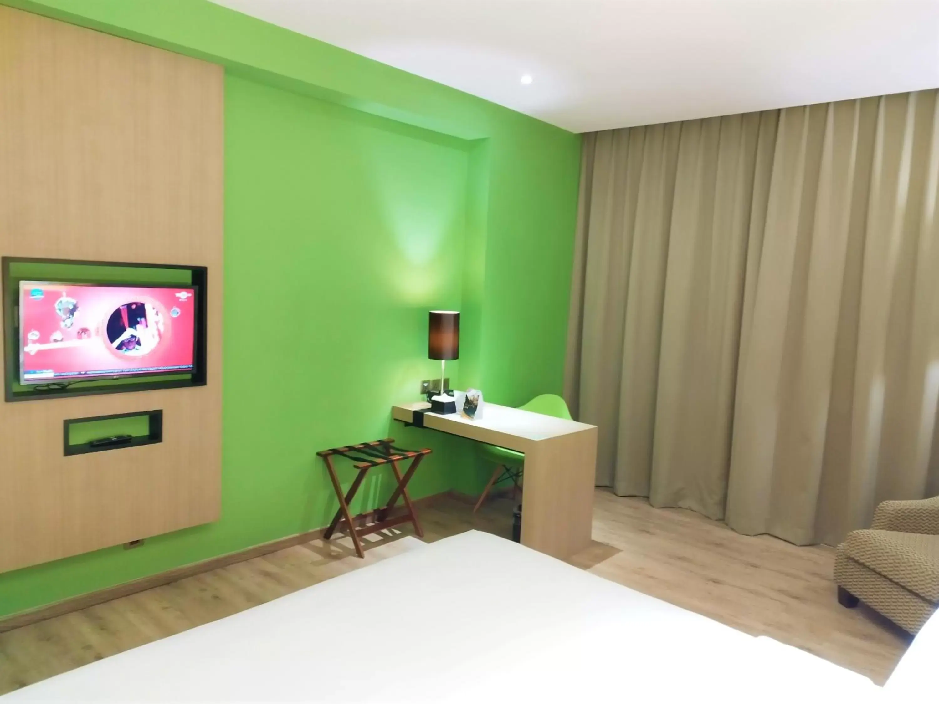 TV/Entertainment Center in AONE Hotel