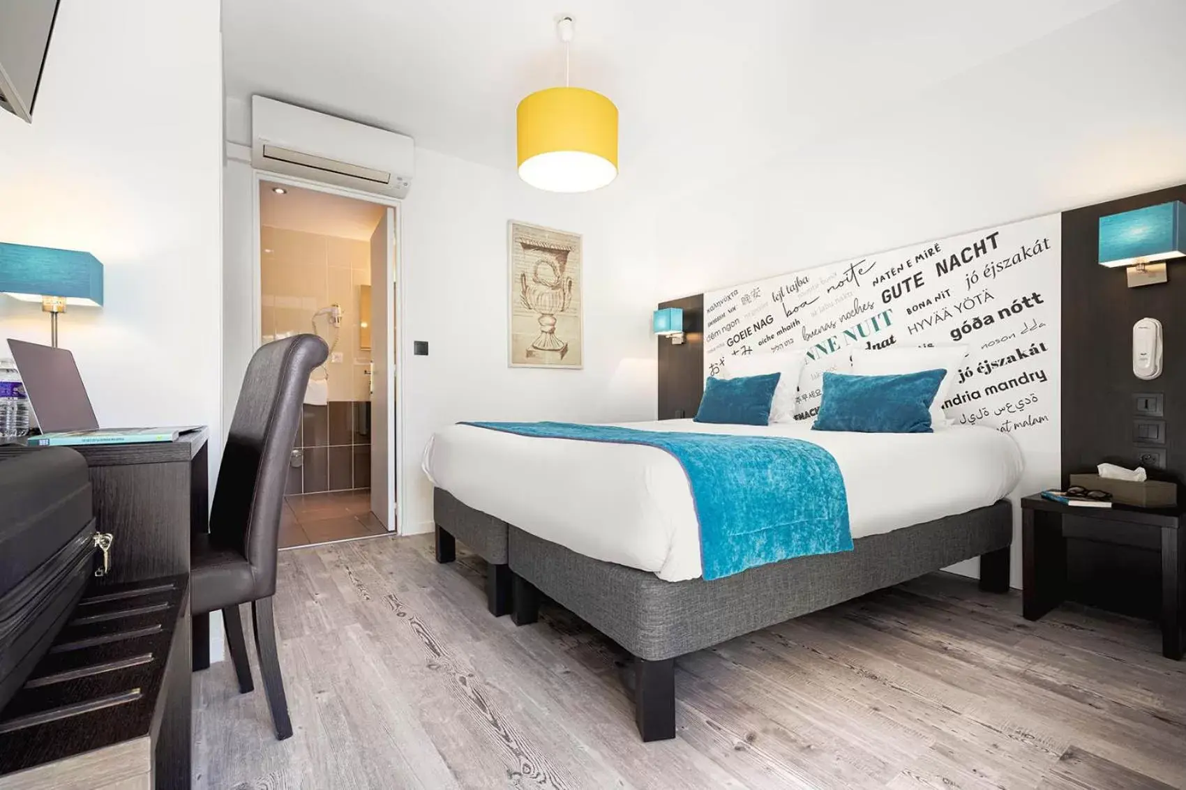 Bedroom, Bed in Contact Hôtels Les Pierres Dorées Bedroom, Bed in Contact Hôtels Les Pierres Dorées