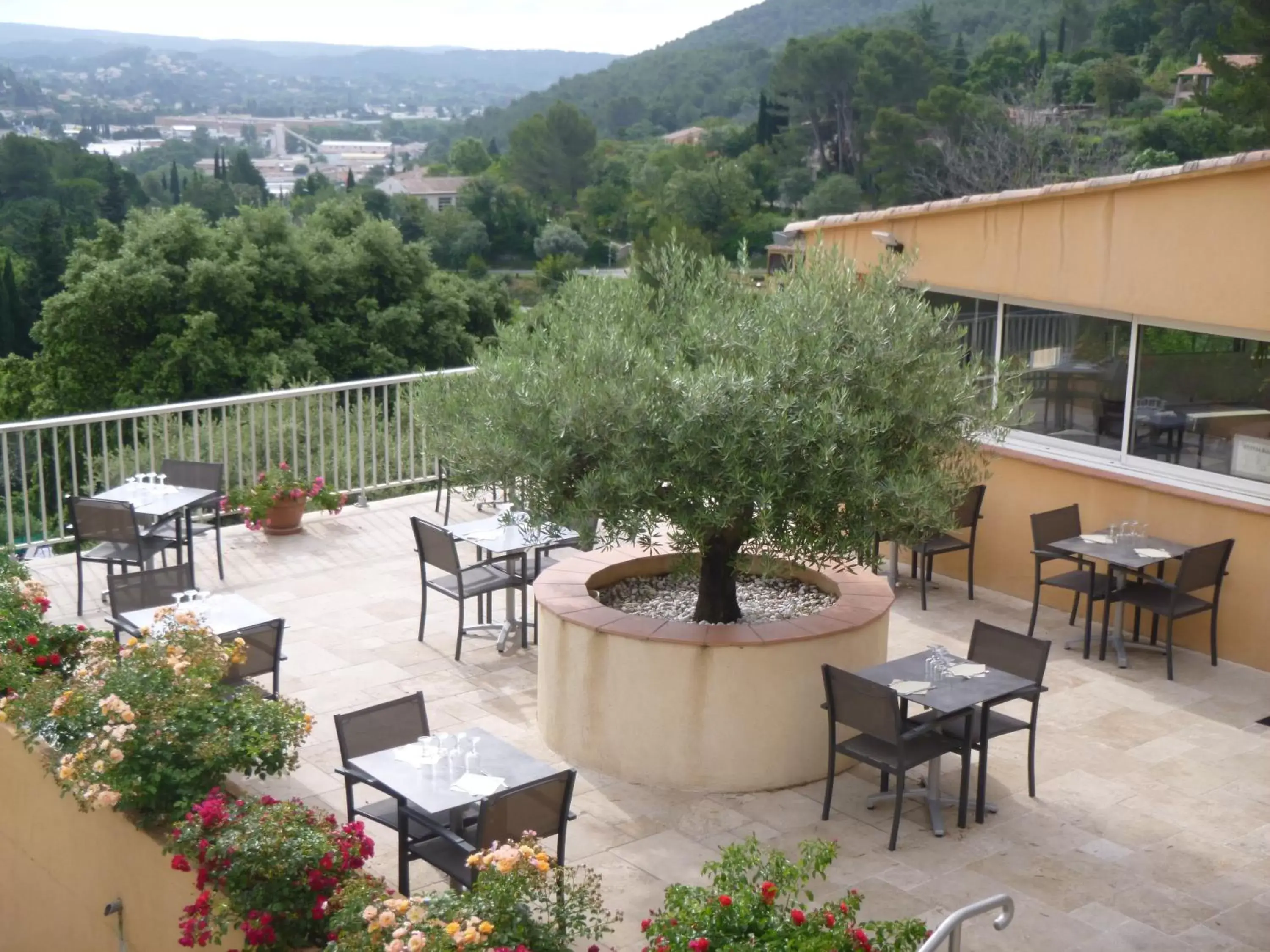 Patio in Logis Hotel Le Col De L'ange