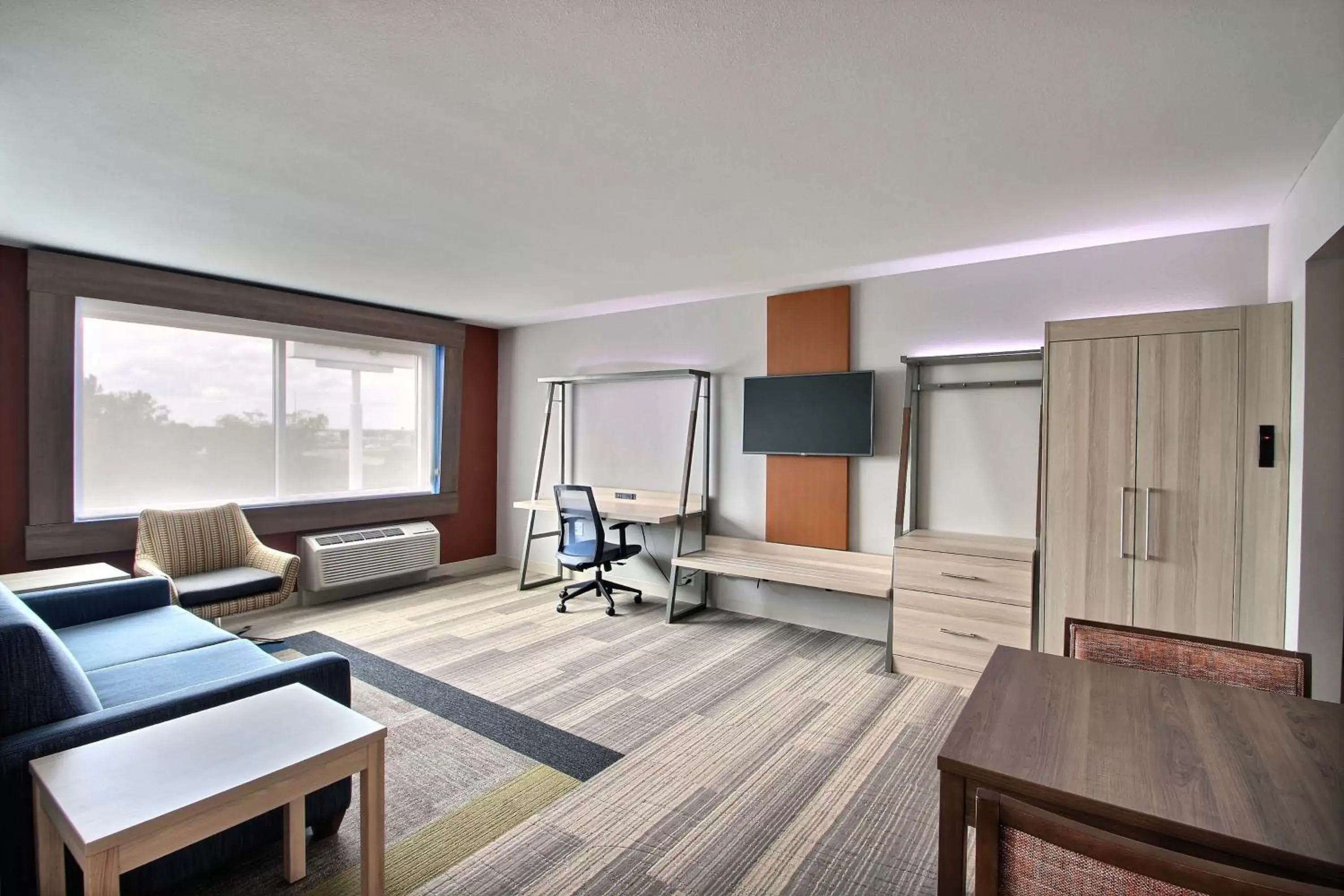 Photo of the whole room, Seating Area in Holiday Inn Express & Suites Fond Du Lac, an IHG Hotel