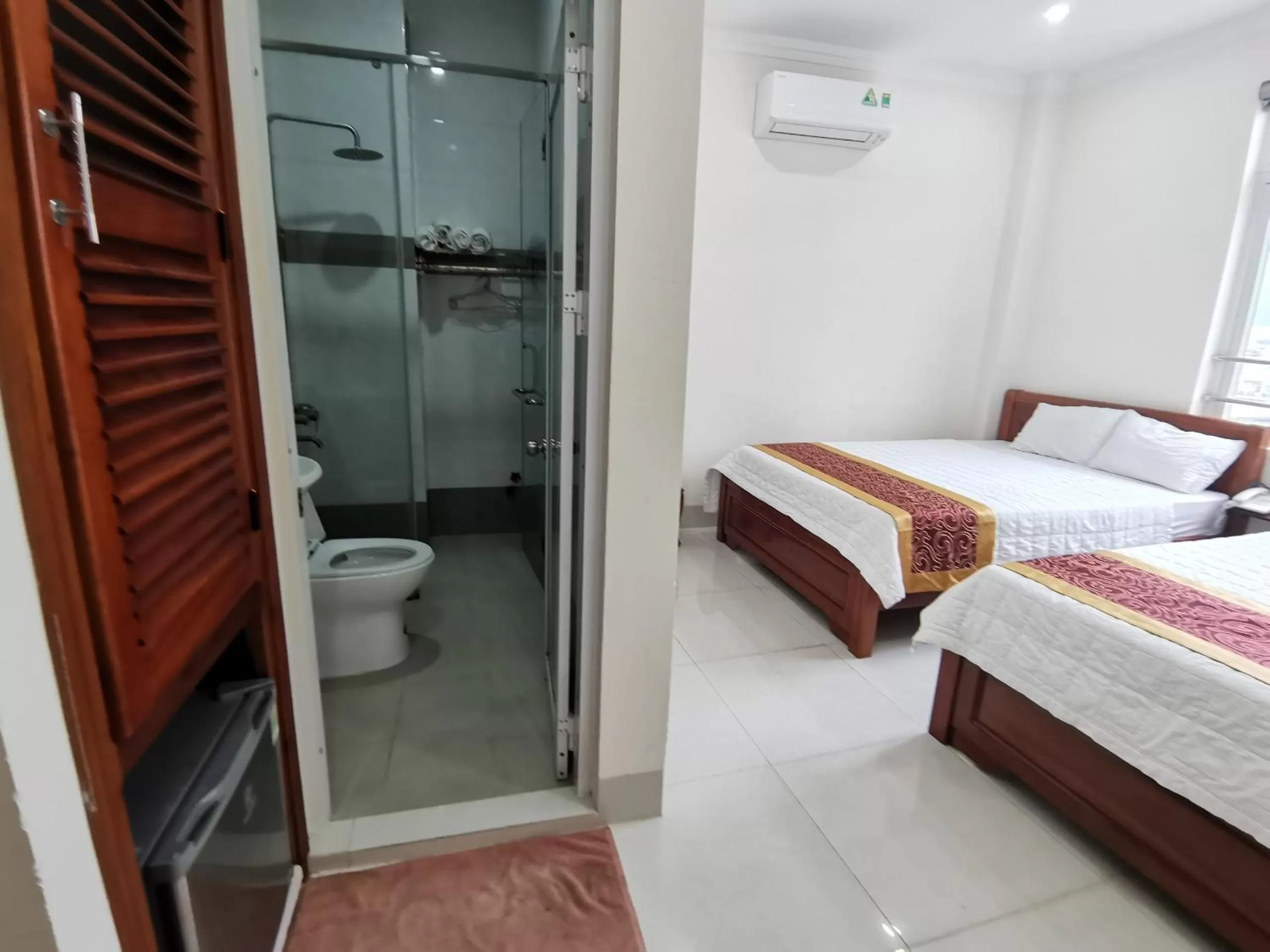 towels, Bed in An Ngân Phú Hotel