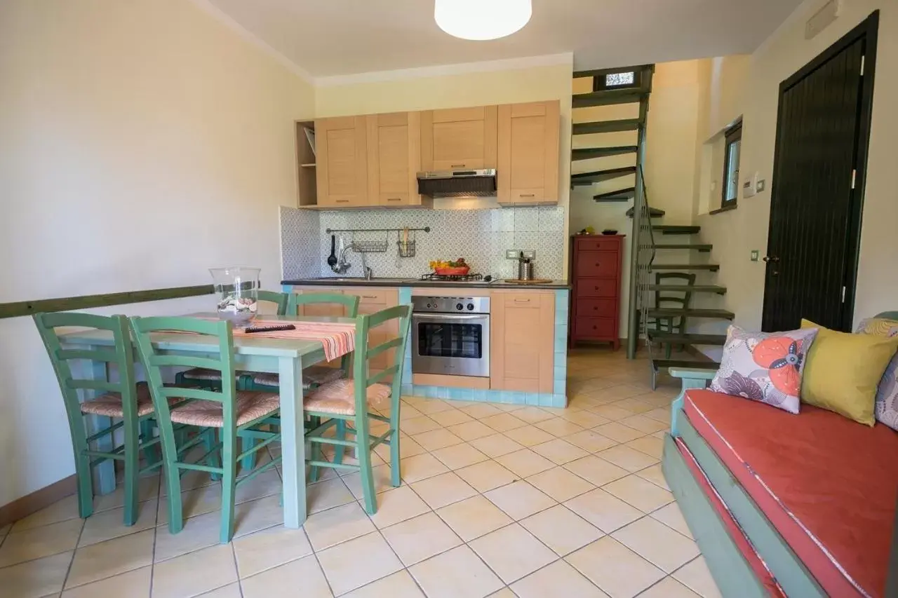 Dining area, Kitchen/Kitchenette in Residence Torre Delle Viole