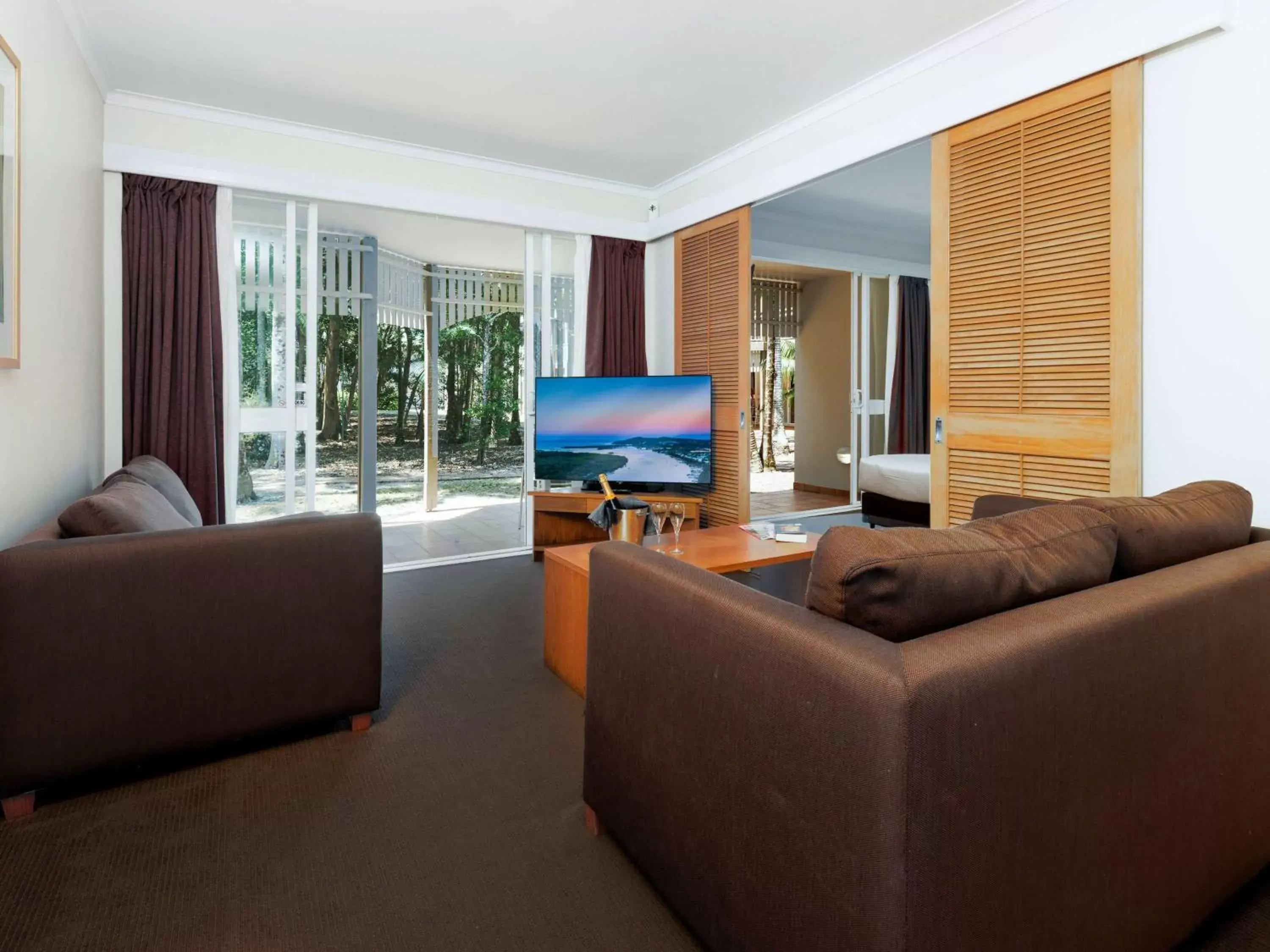 Bedroom, Seating Area in Novotel Sunshine Coast Resort