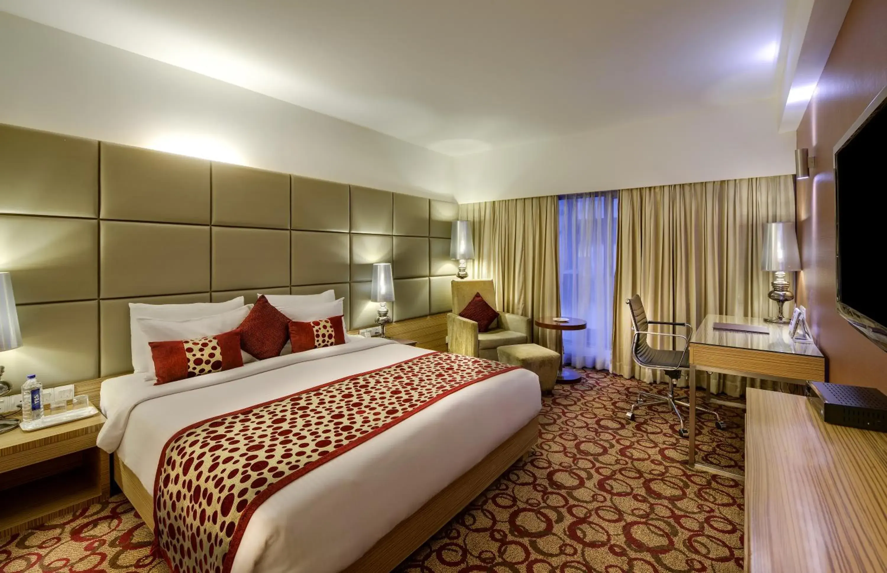 Bed in Pride Plaza Hotel, Ahmedabad