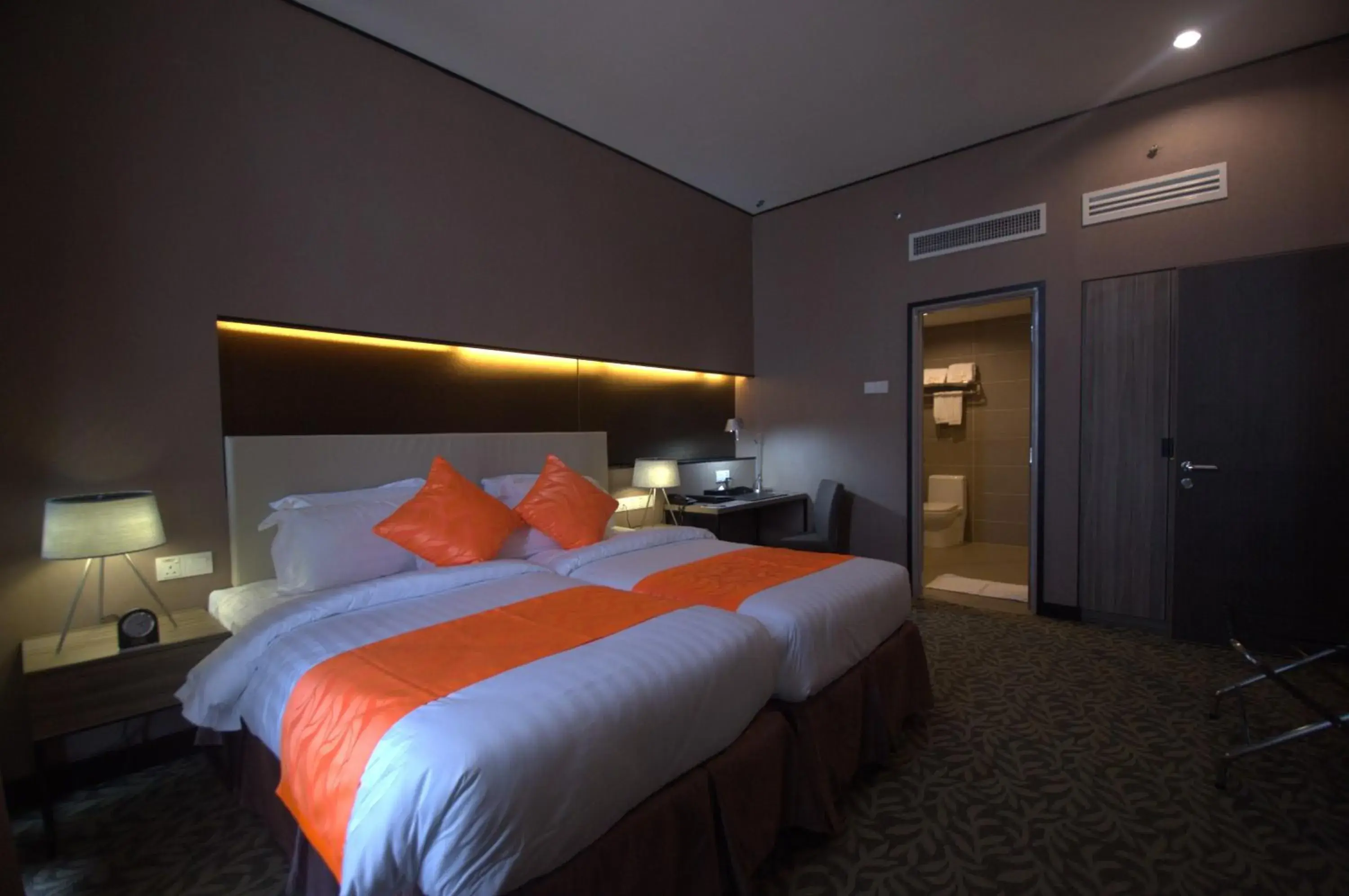 Business facilities, Bed in Grand Alora Hotel