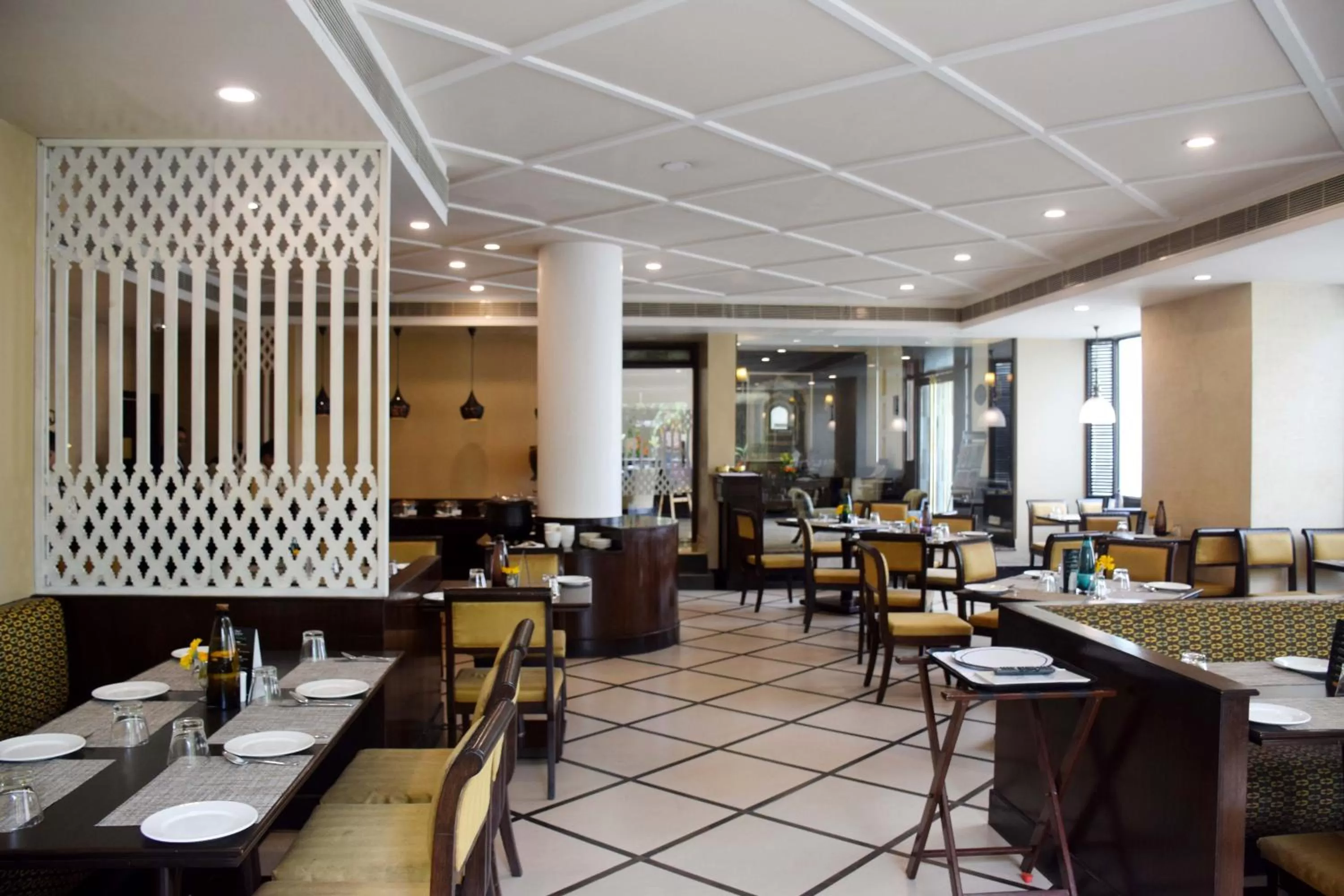 Restaurant/places to eat in La Place Sarovar Portico